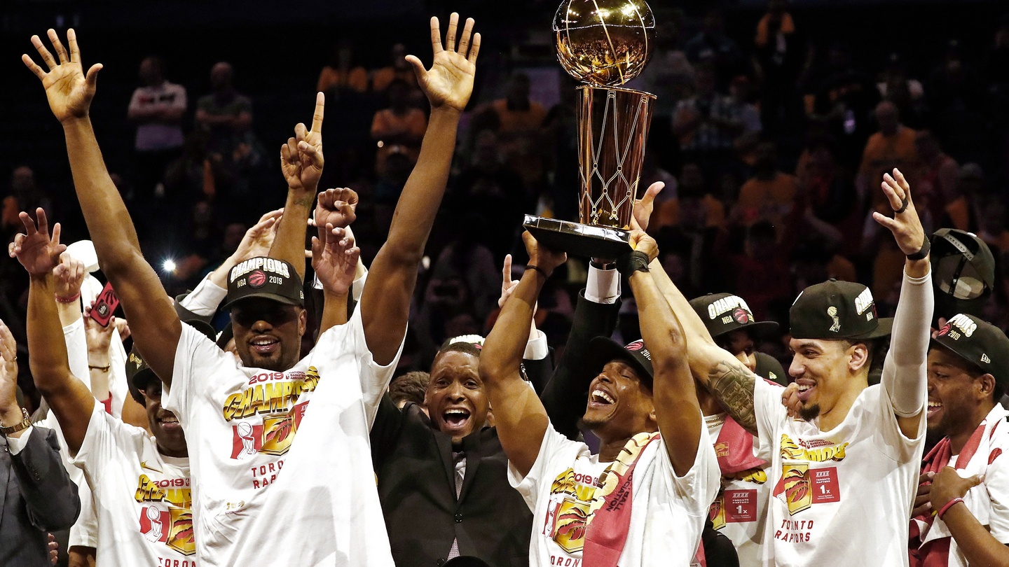 Toronto Raptors guard Kyle Lowry holds the Larry O'Brien Championship Trophy  during the NBA bas …