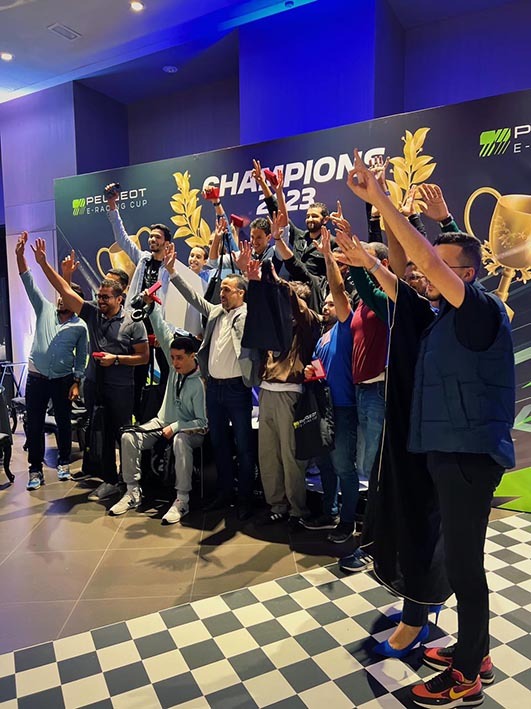 Peugeot a organisé, du 22 mars au 14 avril 2023 dans cinq villes du Maroc, la Peugeot E-Racing Cup, une compétition de simulation de course automobile.