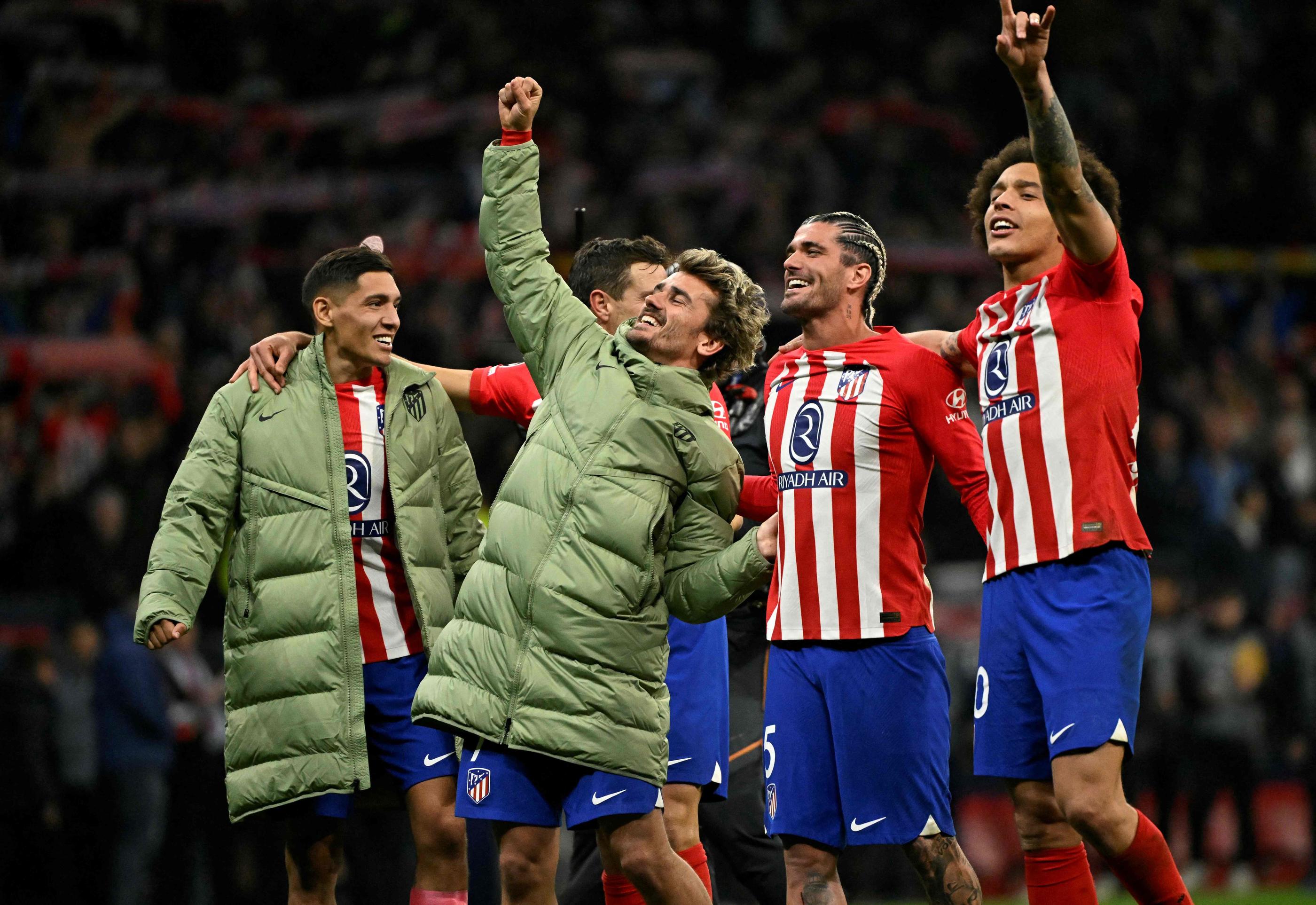 La joie des joueurs de l'Atletico Madrid après leur qualification pour les quarts de finale de la Ligue des champions . AFP/JAVIER SORIANO
