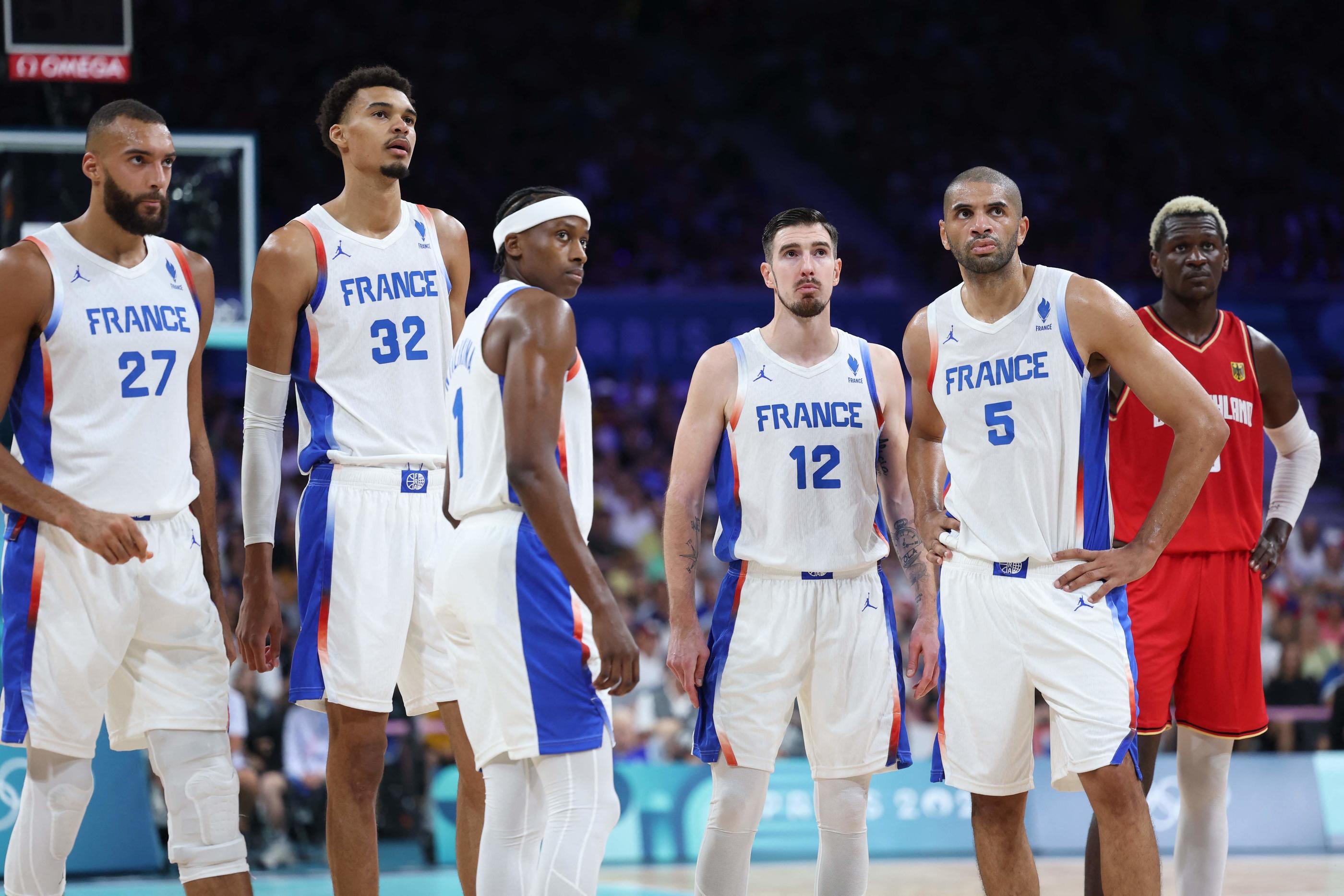 Les Bleus, ici contre l'Allemagne, doivent passer la vitesse supérieure s'ils veulent espérer rejoindre les demi-finales du tournoi olympique. AFP/Thomas Coex