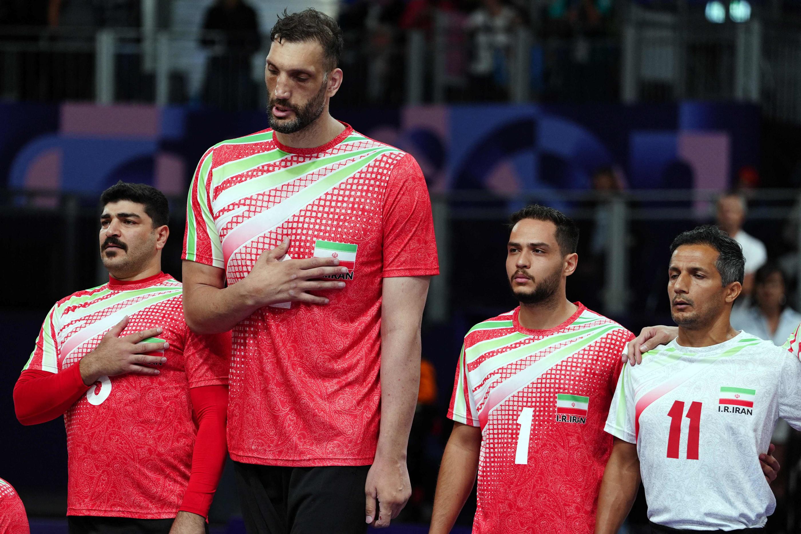 L'Iranien Morteza Mehrzad (au milieu) est une star du volley assis. AFP/Dimitar Dilkoff