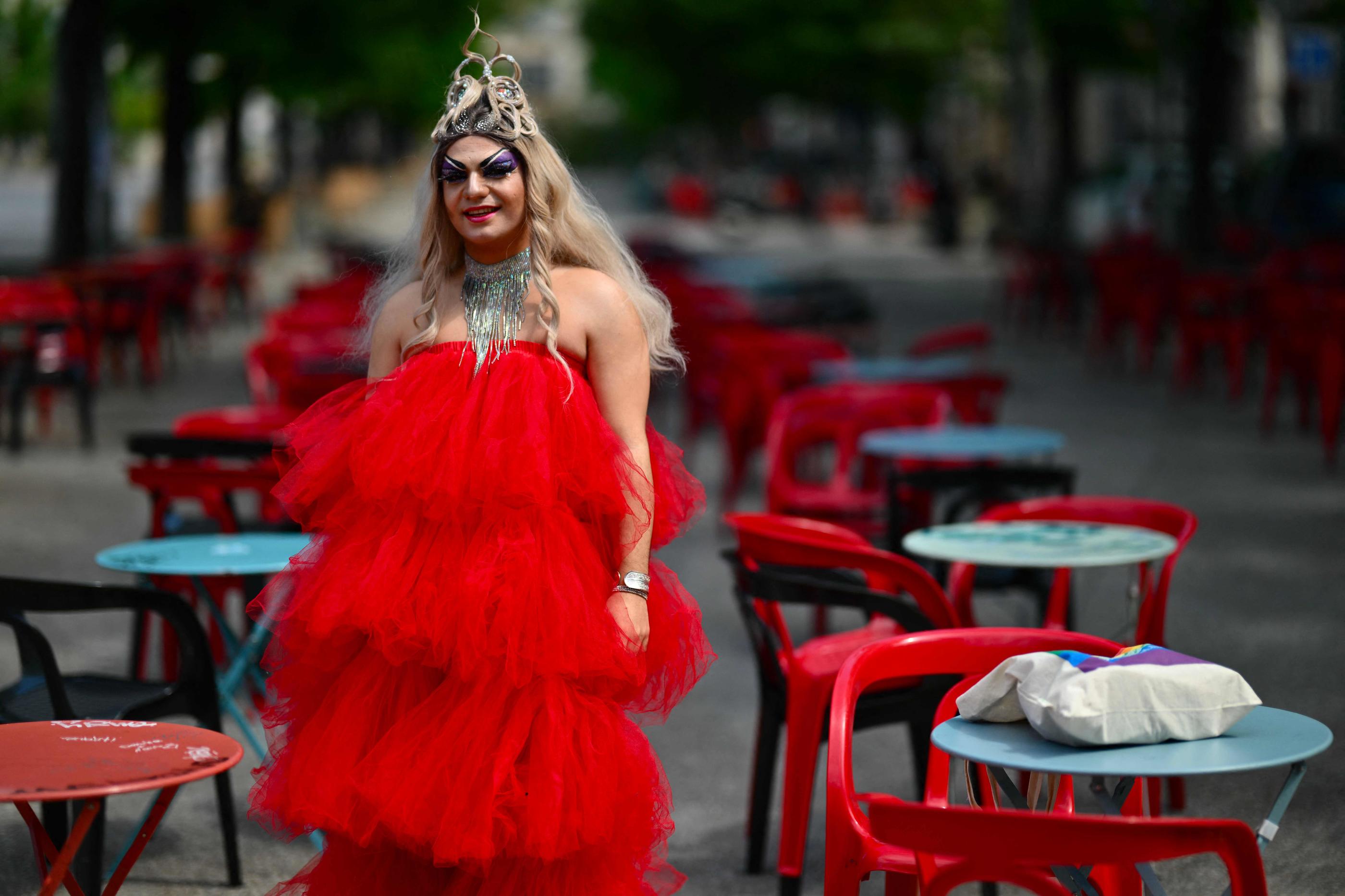 Martin Namias, also known as drag queen "Miss Martini", will holds the Olympic flamme on May 11 in Dignes, poses in Marseille on May 3, 2024. (Photo by Christophe SIMON / AFP)