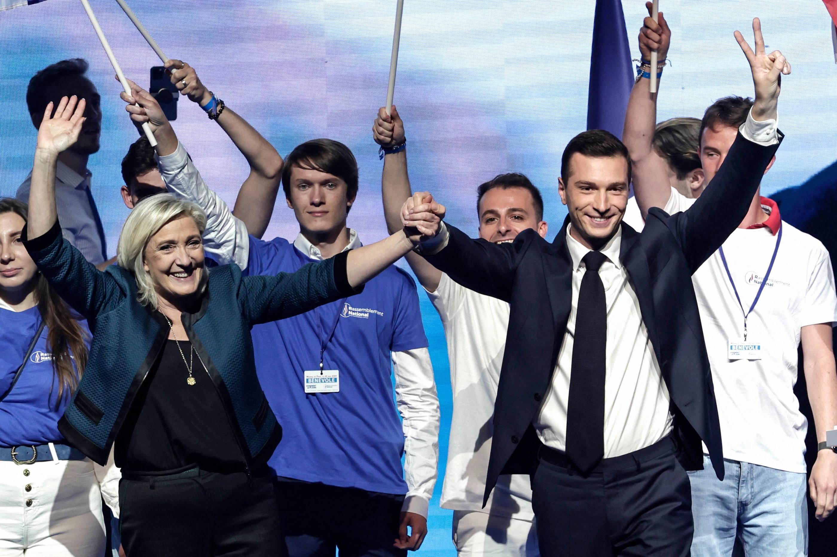 Marine Le Pen et Jordan Bardella, le 2 juin, lors du meeting RN à Paris en vue des européennes. AFP/Stephane De Sakutin