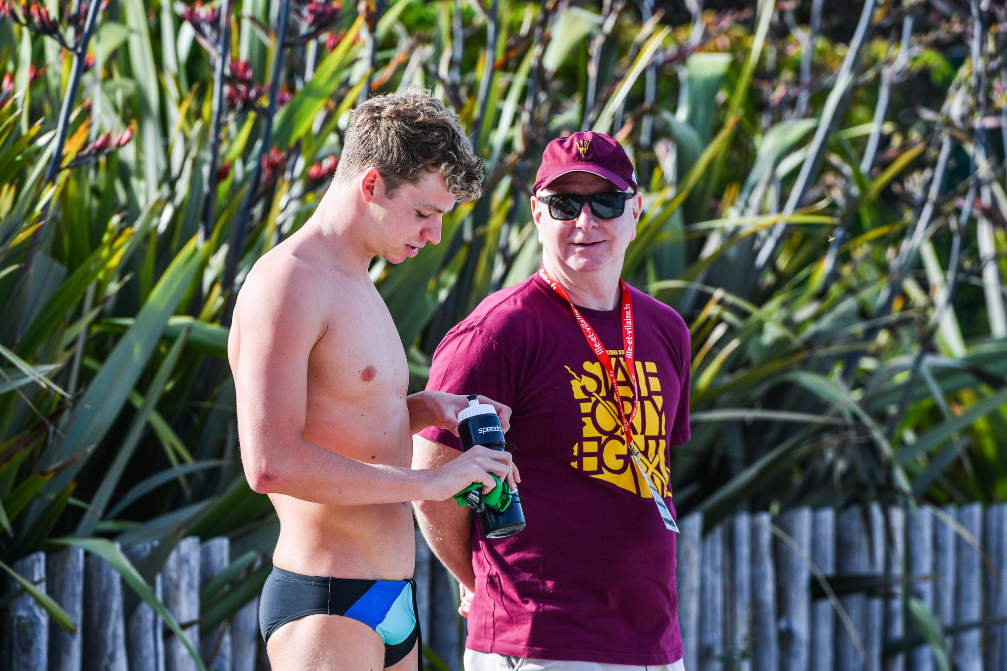 Aux États-Unis depuis trois ans, Léon Marchand s'est imprégné des méthodes d'entraînement et du mode de vie sur les campus, survolant notamment les finales universitaires avec Arizona State sous la houlette du mythique Bob Bowman (à droite). Icon Sport/Daniel Derajinski