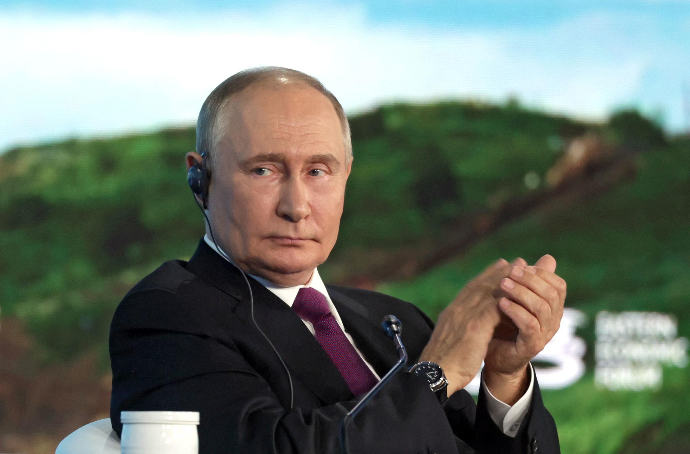 In this pool photograph distributed by the Russian state agency Sputnik, Russia's President Vladimir Putin attends a plenary session of the Eastern Economic Forum in Vladivostok on September 5, 2024. (Photo by Vyacheslav PROKOFYEV / POOL / AFP)