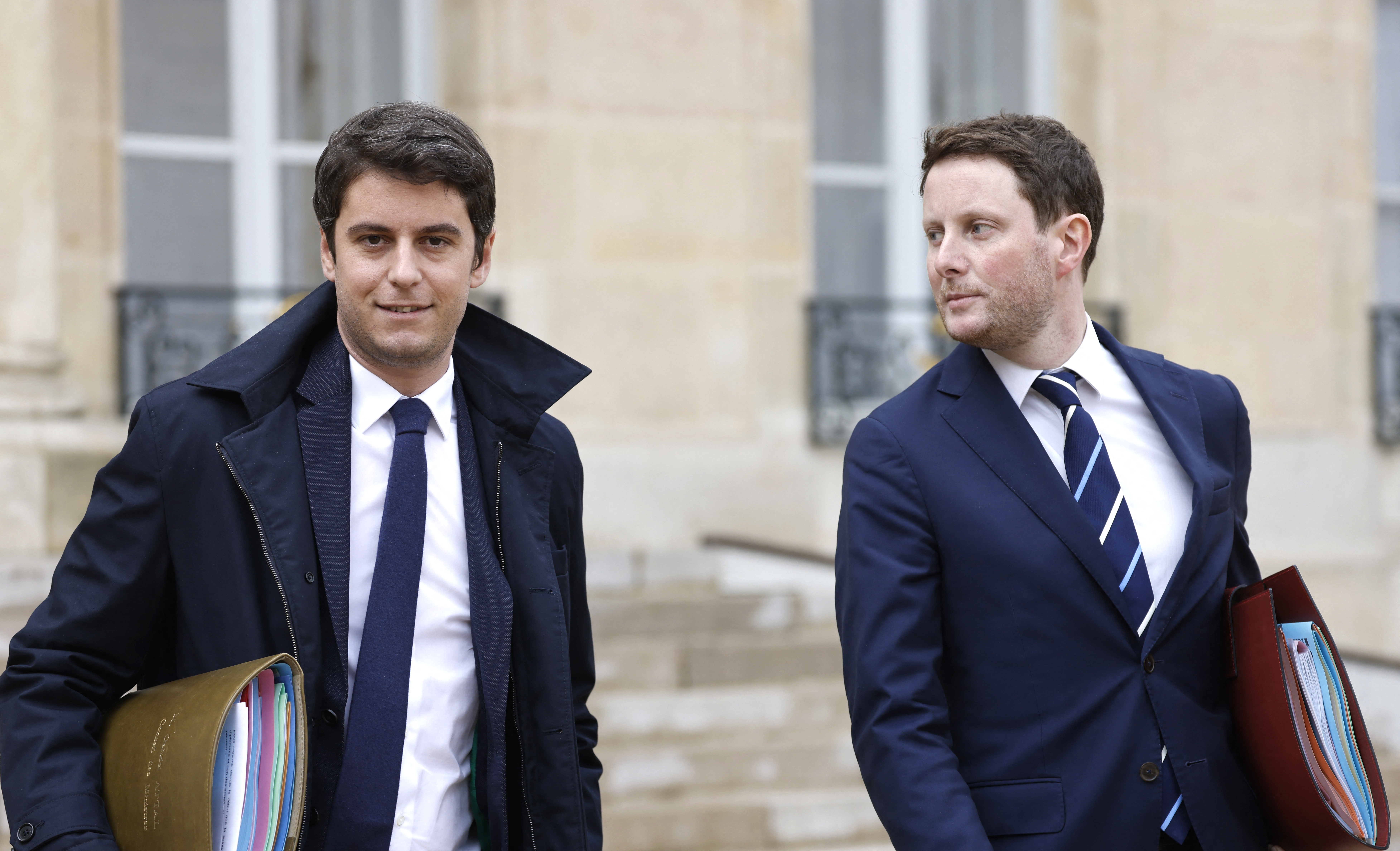 Gabriel Attal et Clément Beaune en mars 2022 à l'Elysée. AFP/Ludovic Marin