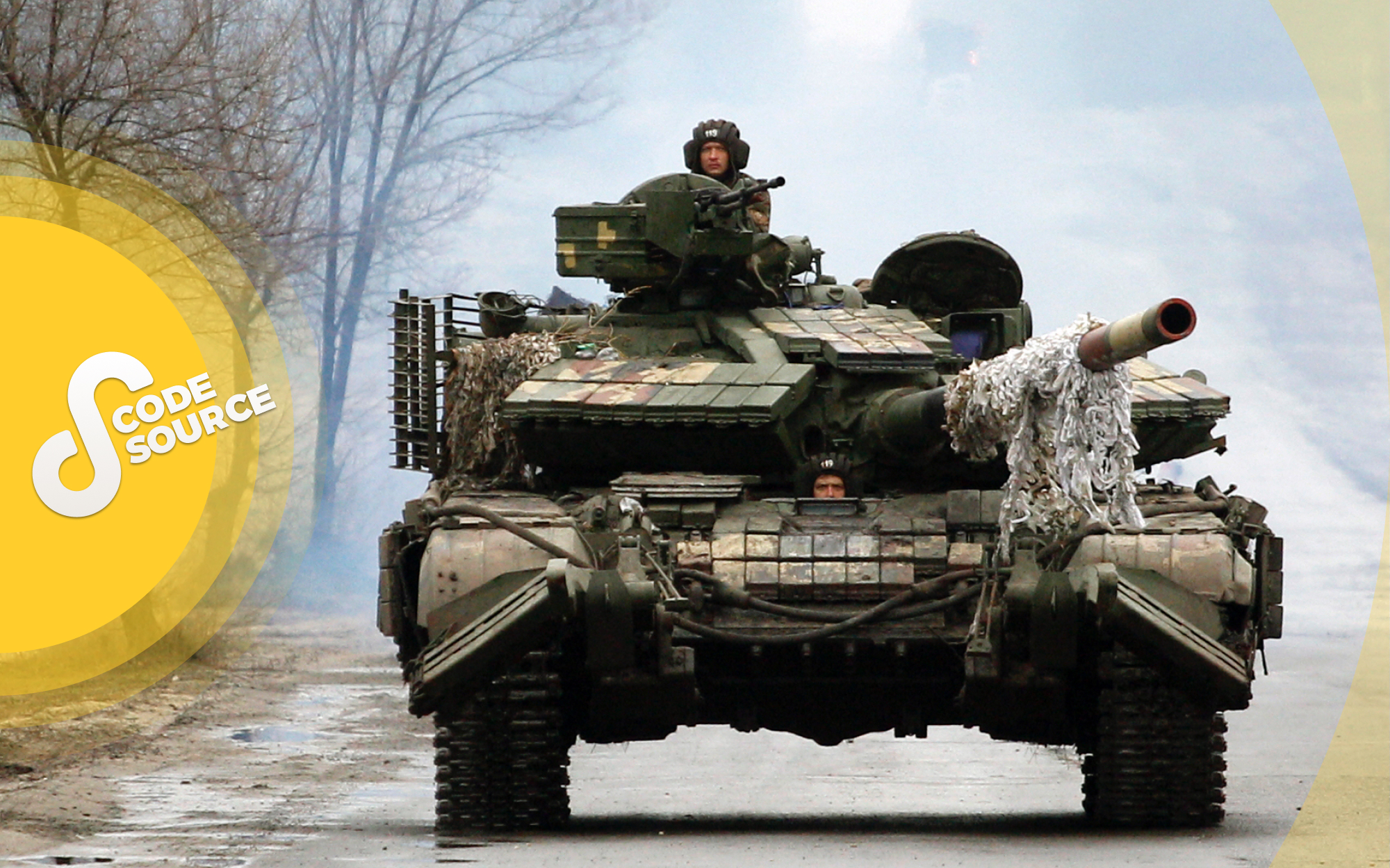 Des militaires ukrainiens montent sur des chars vers la ligne de front, face aux forces russes dans la région de Lugansk en Ukraine le 25 février 2022.