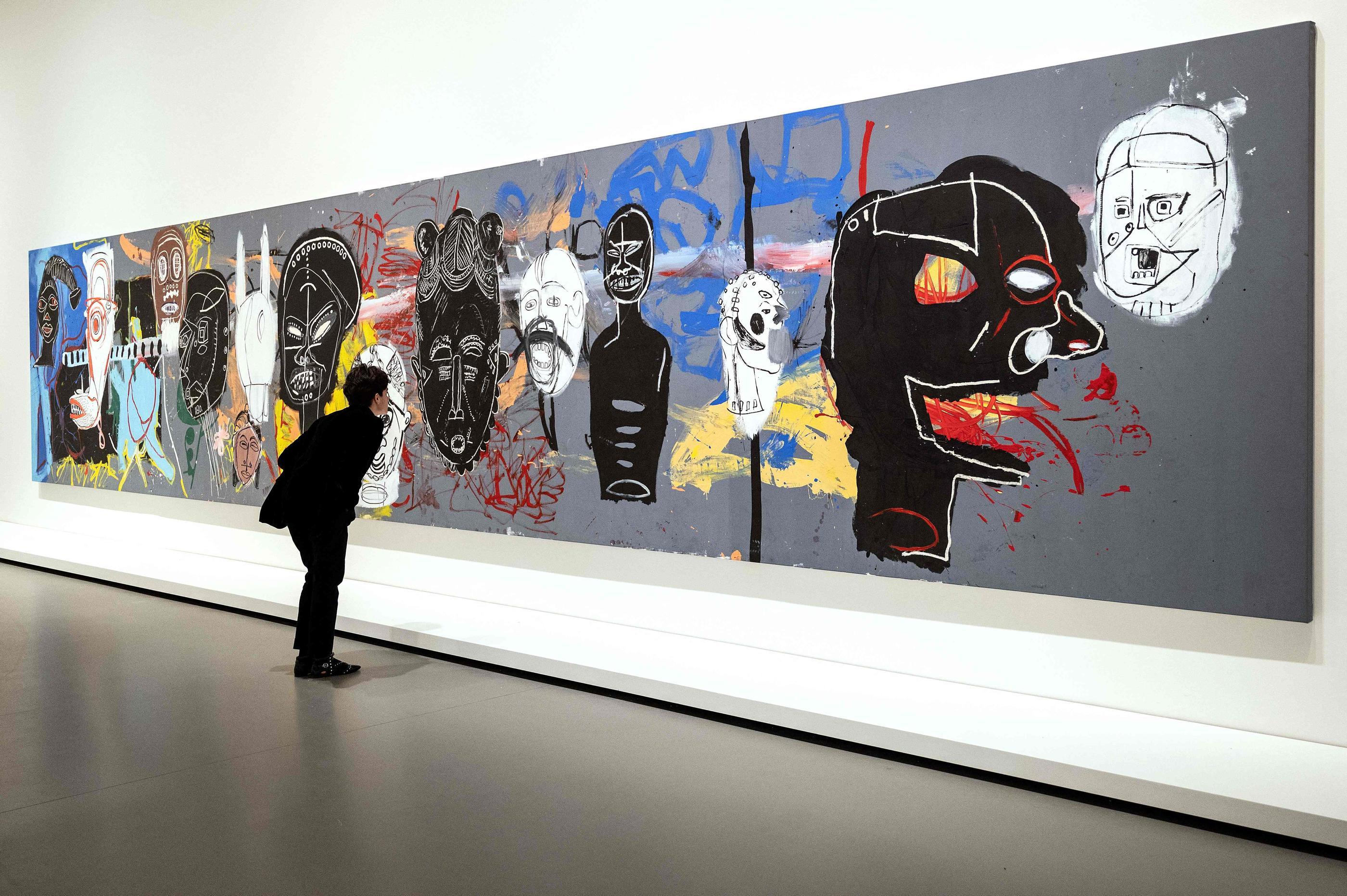 Fondation Louis-Vuitton, Paris XVIe, le 29 mars. Warhol et Basquiat ont peint à quatre mains des tableaux-fresques de taille monumentale en mêlant leurs styles et leurs sujets. AFP/Bertrand Guay