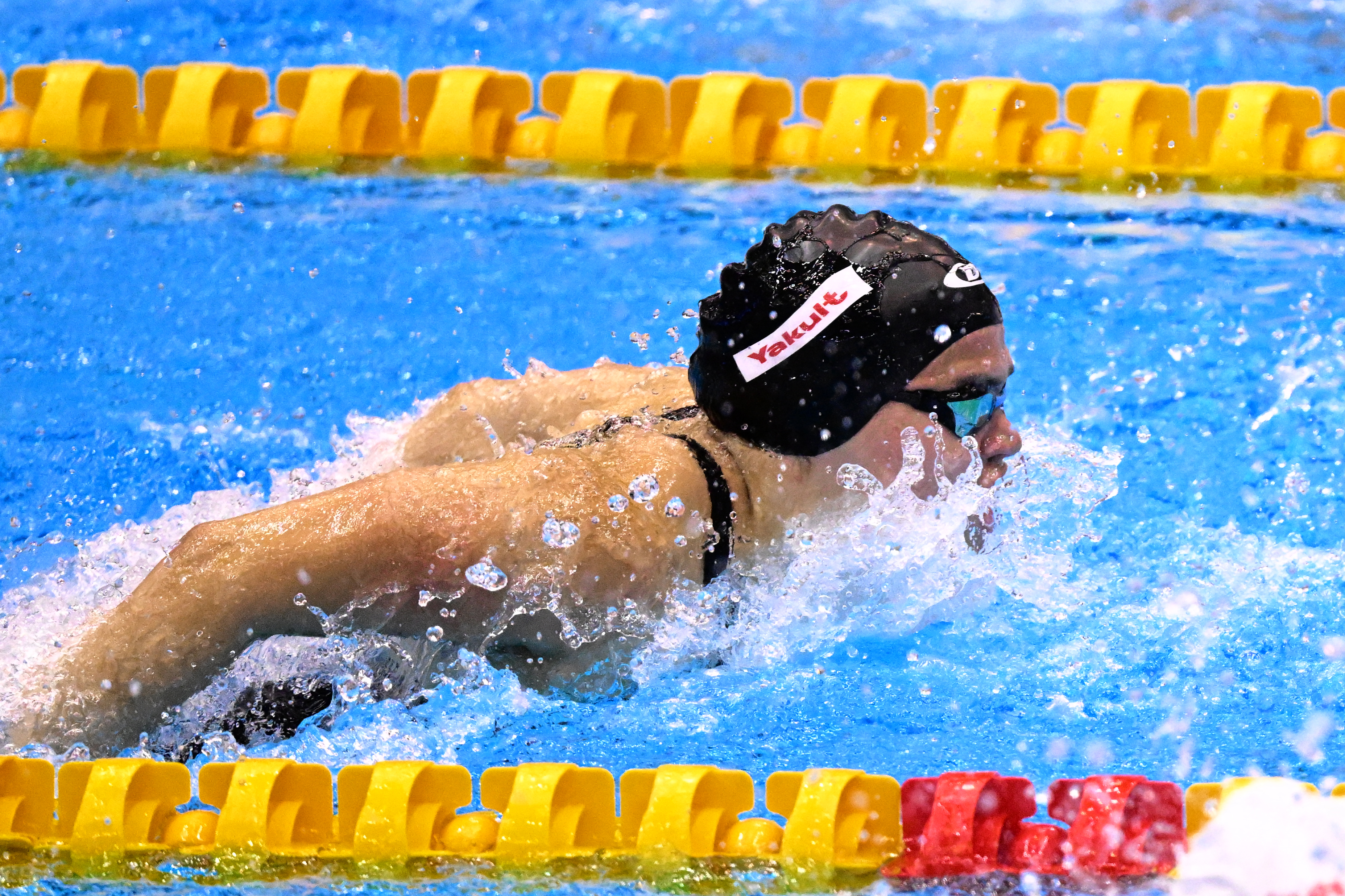 Luana Alonso s'est retirée de la natation après son élimination dès les séries du 100 m papillon. AFP/Yuichi Yamazaki