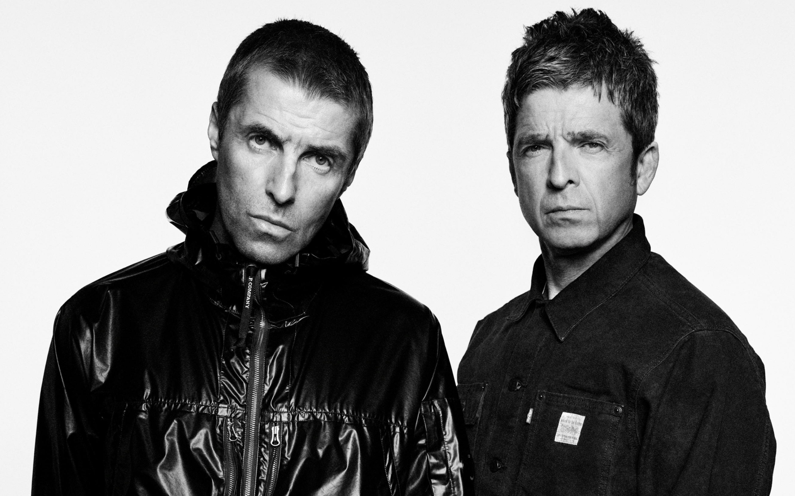 Les frères Liam et Noel Gallagher ont annoncé la reformation surprise d'Oasis, le 27 août. Simon Emmett