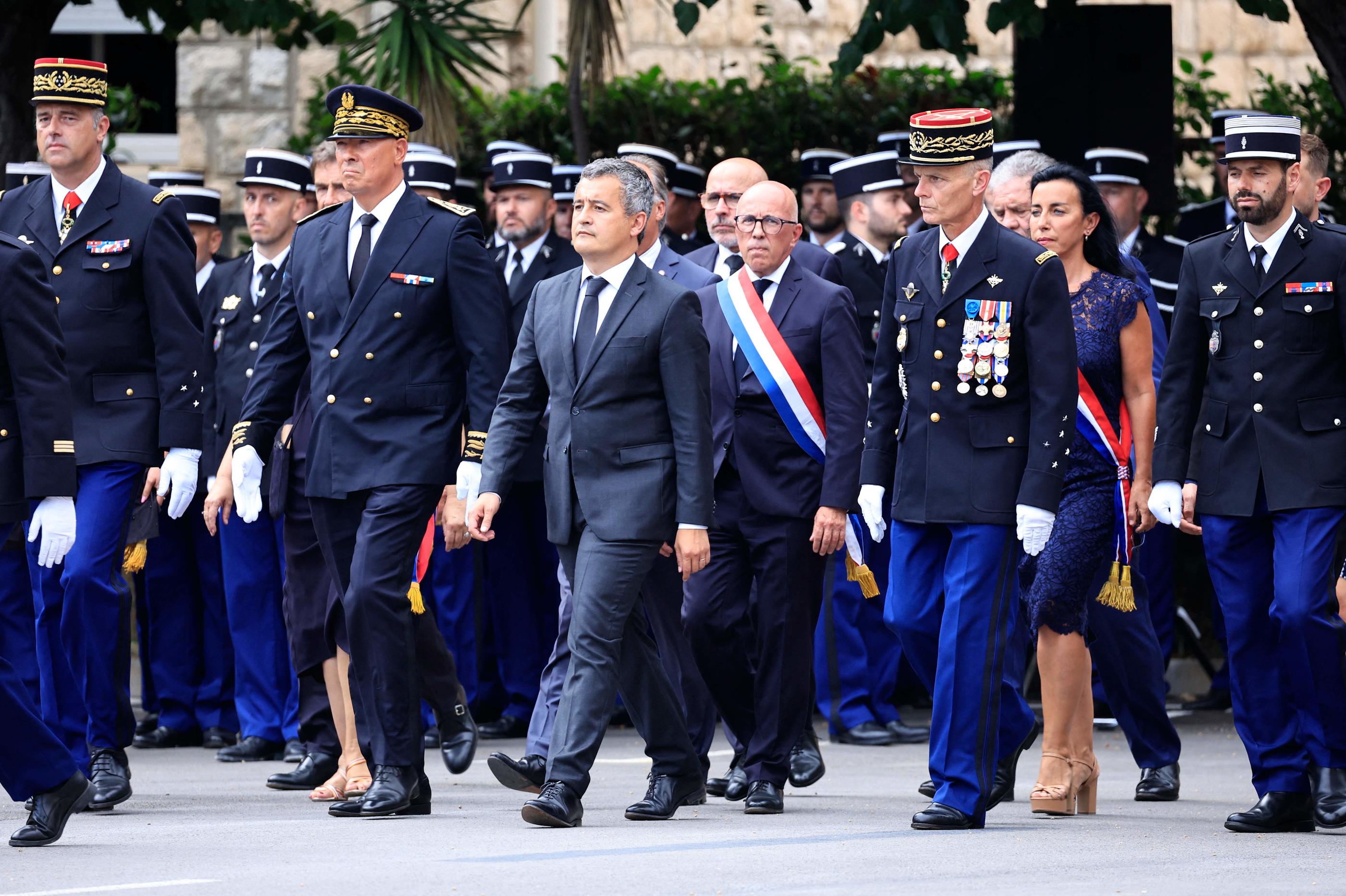 Gérald Darmanin, ministre de l'Intérieur démissionnaire, présidait lundi une cérémonie d'hommage au gendarme tué par un chauffard lundi dernier. AFP/Valery Hache.