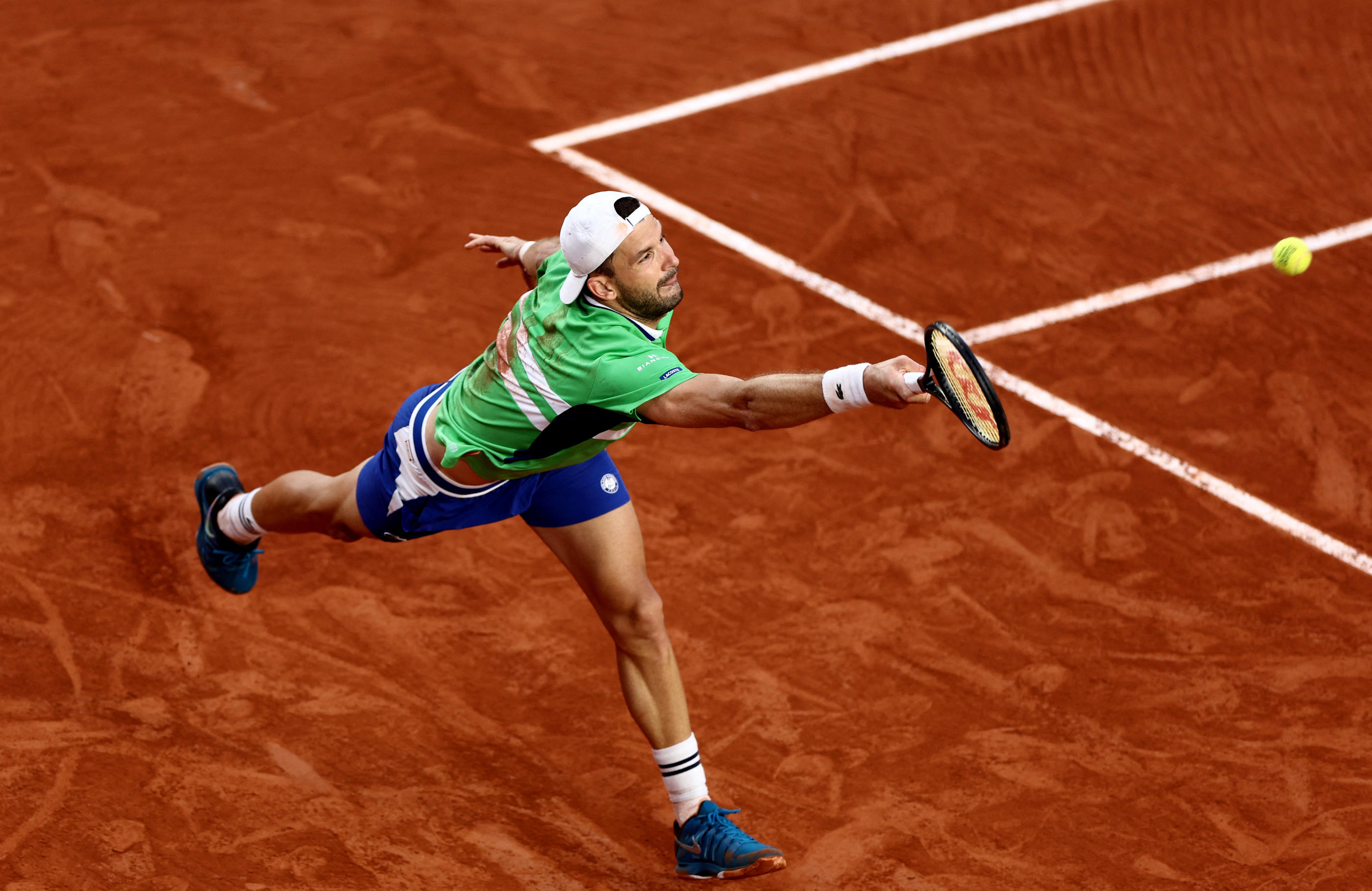 Le Bulgare Grigor Dimitrov s'est qualifié pour les quarts de finale. Reuters/Stephanie Lecocq