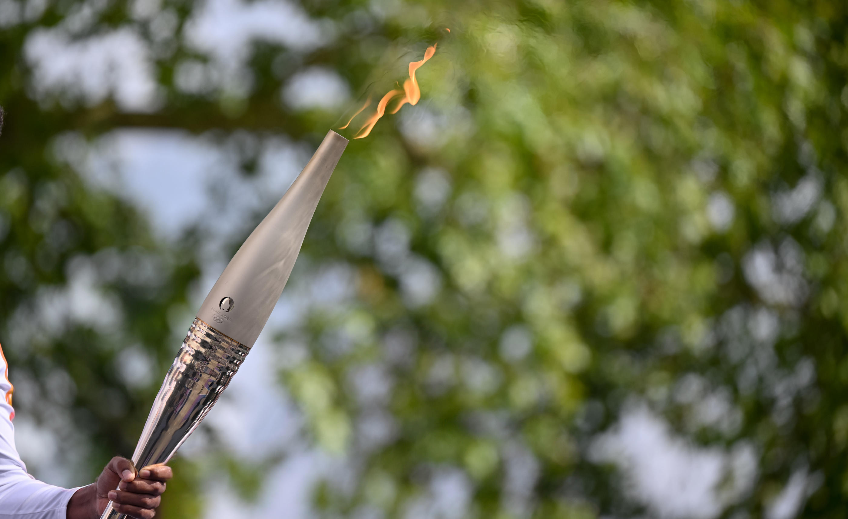 Une centaine de porteurs se relaieront sur les 25 km que parcourra la flamme olympique dans le Val-de-Marne dimanche 21 juillet. Icon Sport/Loic Cousin