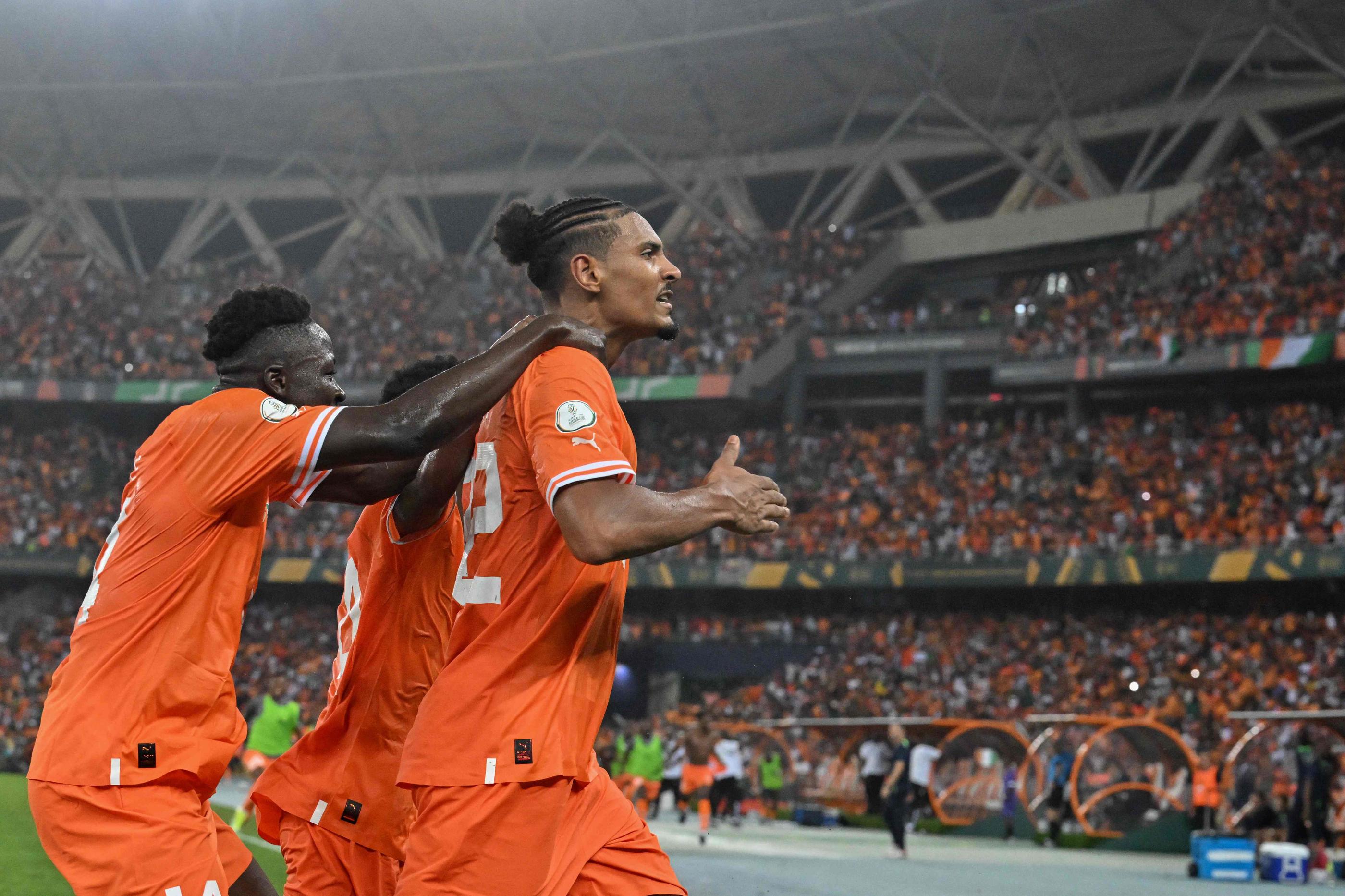 Miraculée dans la compétition, la Côte d'Ivoire de Sébastien Haller a fait tomber le Nigeria, dimanche à Abidjan en finale de la CAN 2024. Issouf SANOGO/AFP