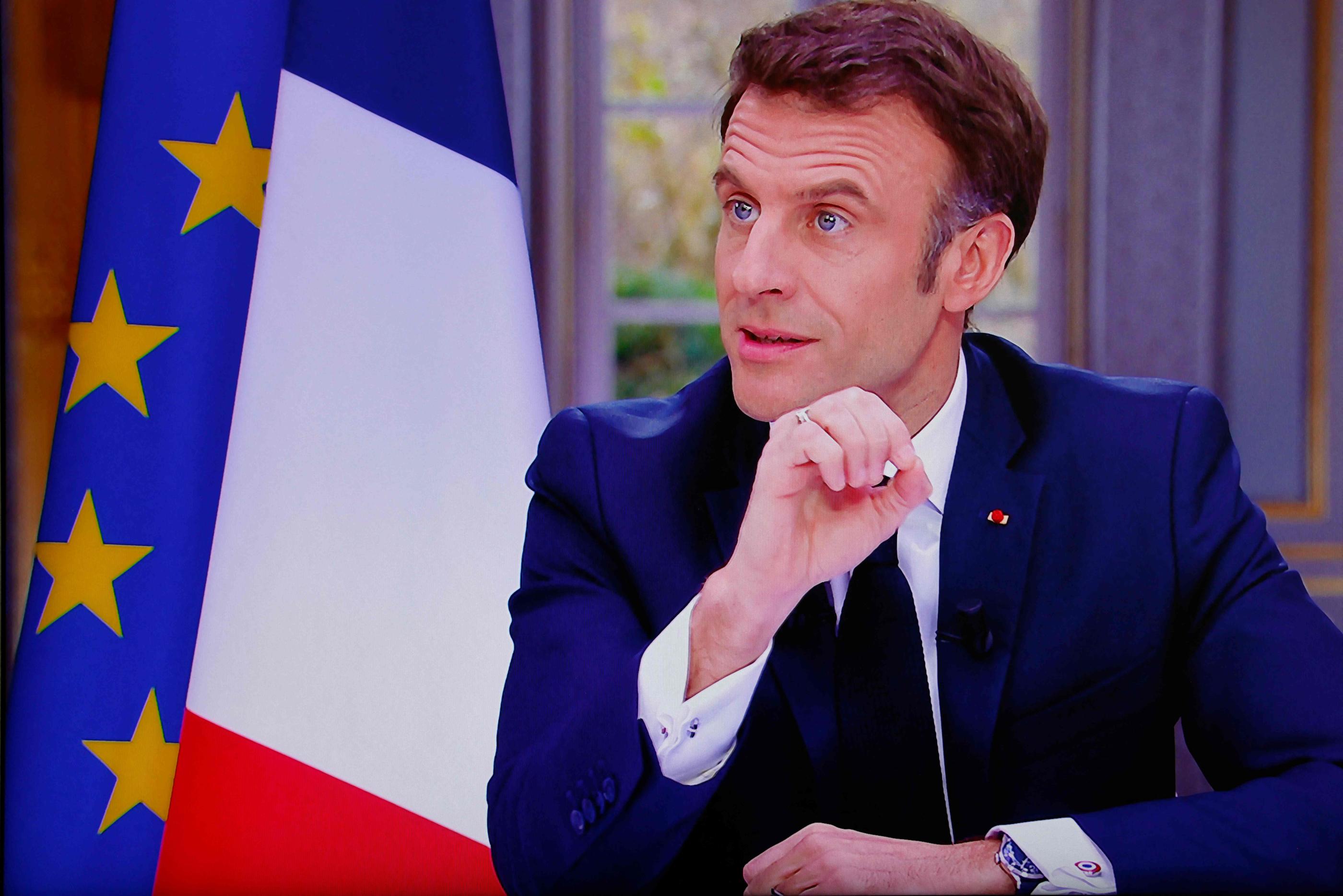 Emmanuel Macron était interrogé sur TF1 et France 2 sur la réforme des retraites. AFP/Ludovic Marin