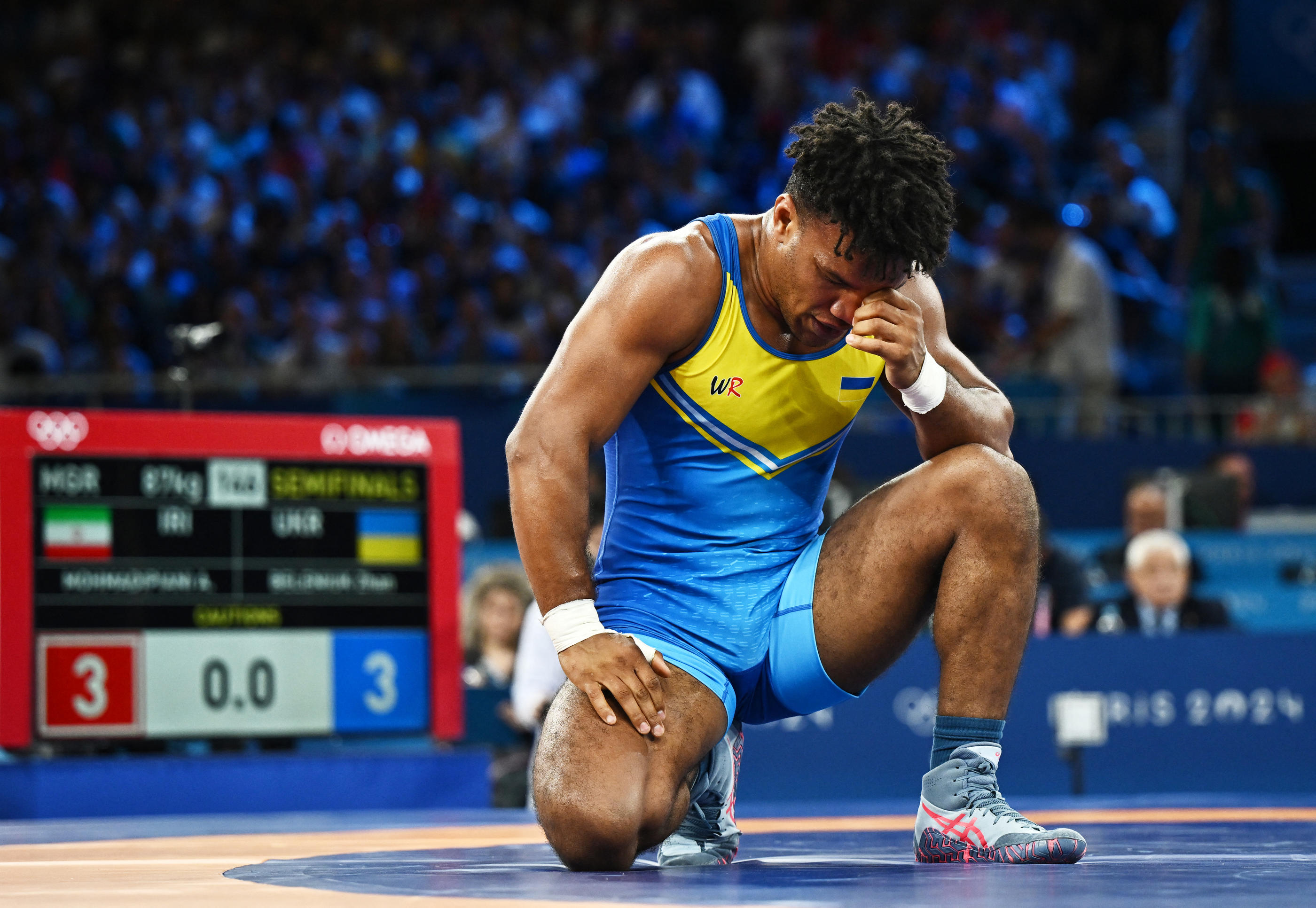 Paris, Arena Champ de Mars, mercredi 7 août. Zhan Beleniuk a été défait en demi-finale par le lutteur iranien Alireza Mohmadipiani. Il se battra ce jeudi pour la médaille de bronze (Reuters/Arlette Bashizi).