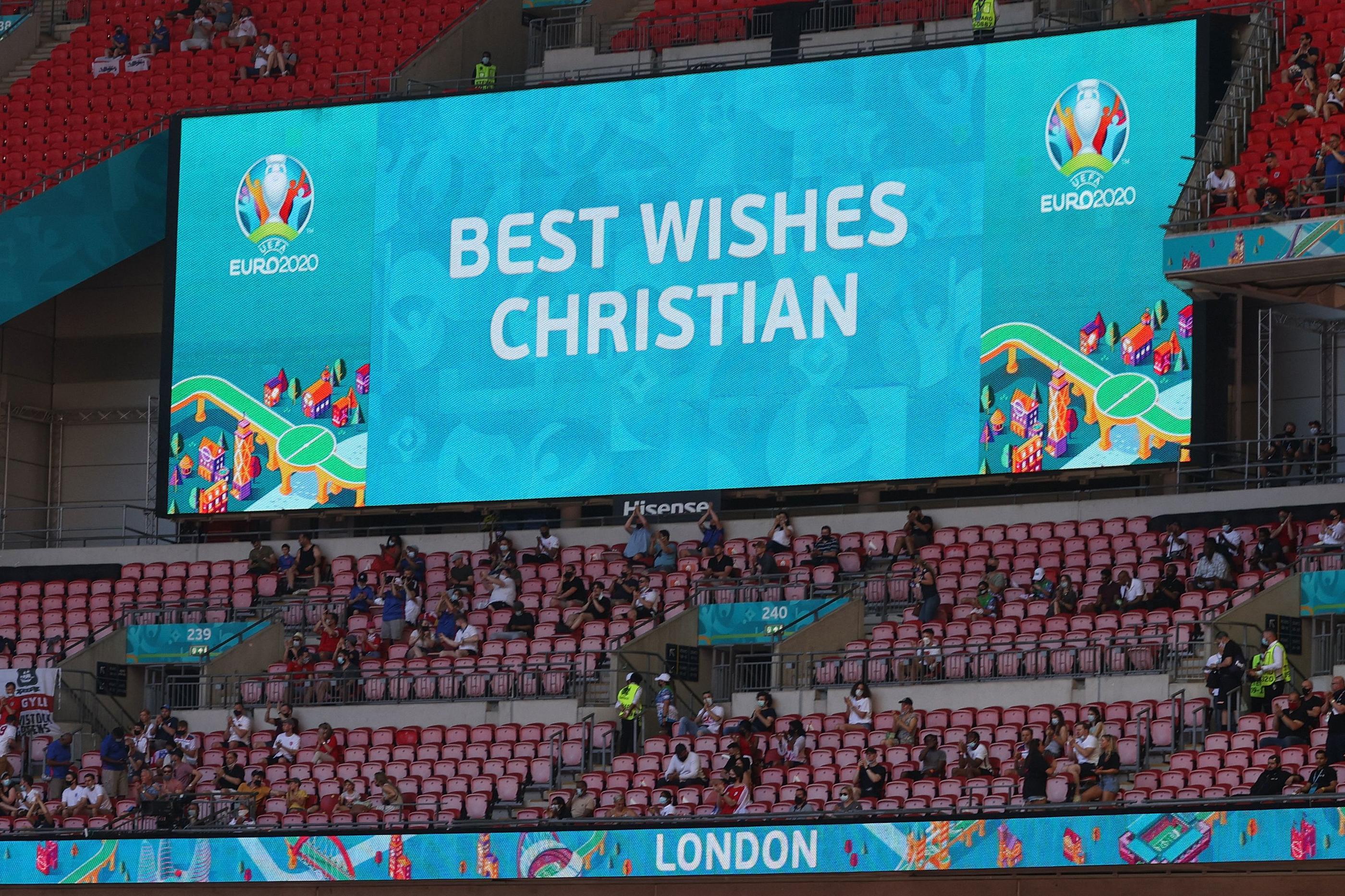 Londres, le 13 juin 2021. Un message de soutien au Danois Christian Eriksen est affiché avant le match entre l'Angleterre et la Croatie. AFP/Catherine Ivill