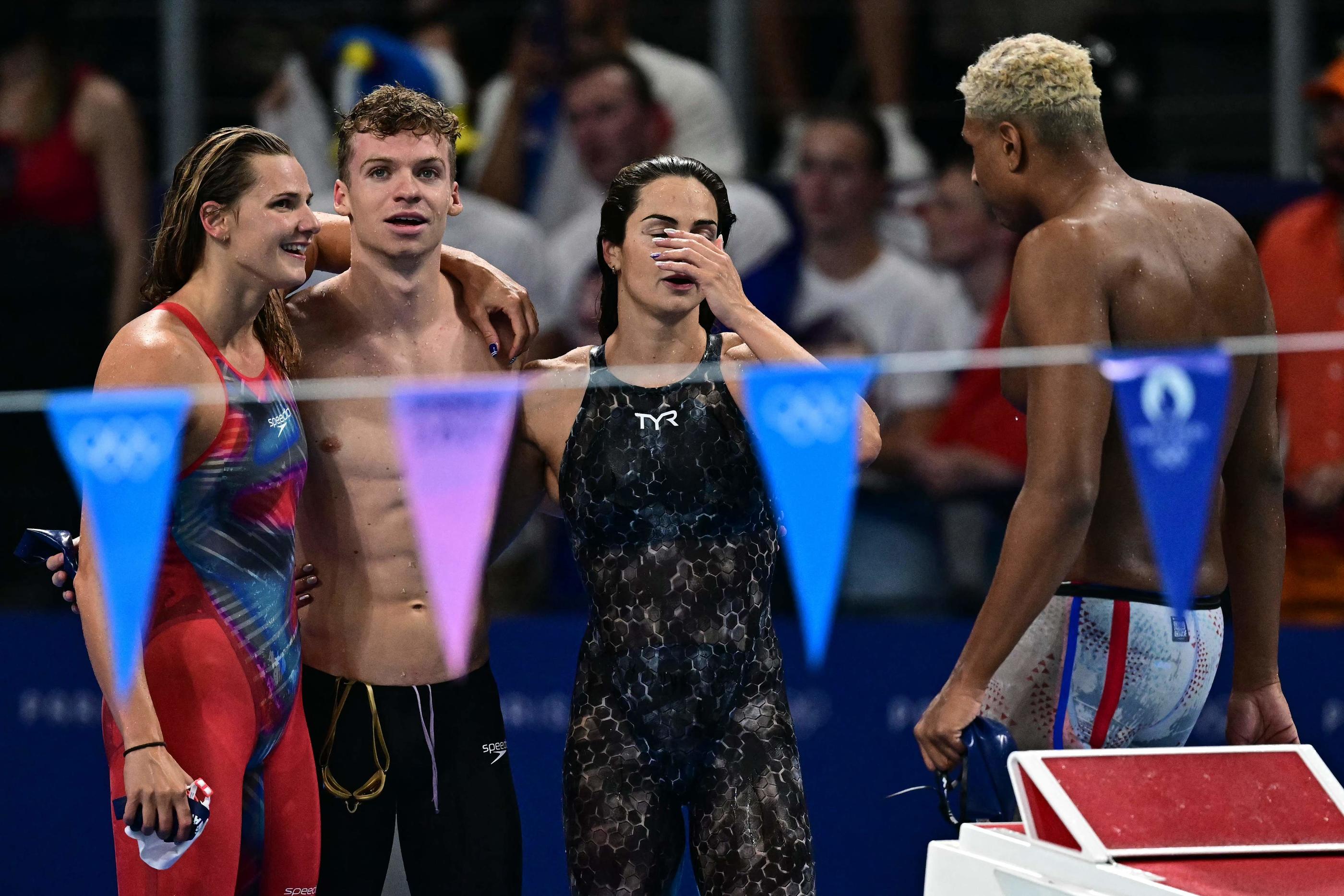 Marie Wattel, Léon Marchand, Beryl Gastaldello et Yohann Ndoye-Brouard ont fini 4e du relais mixte. Manan VATSYAYANA/AFP