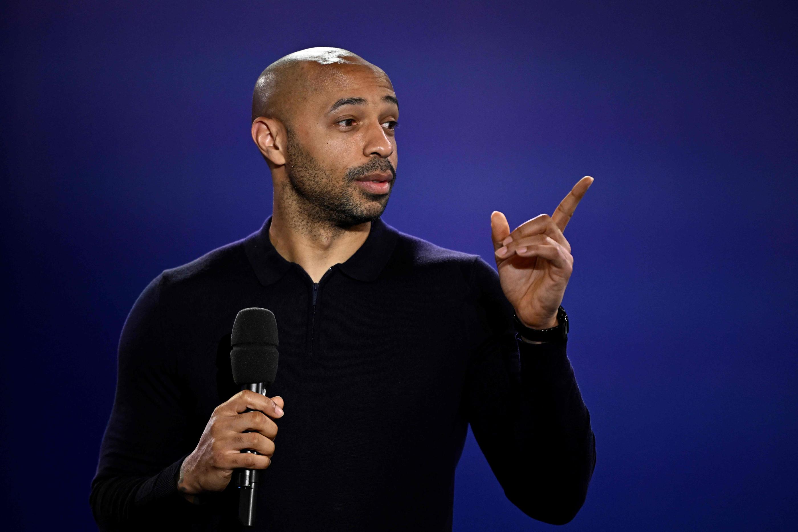 Thierry Henry lors du tirage au sort, ce mercredi soir, au Cojo. (Photo JULIEN DE ROSA / AFP)