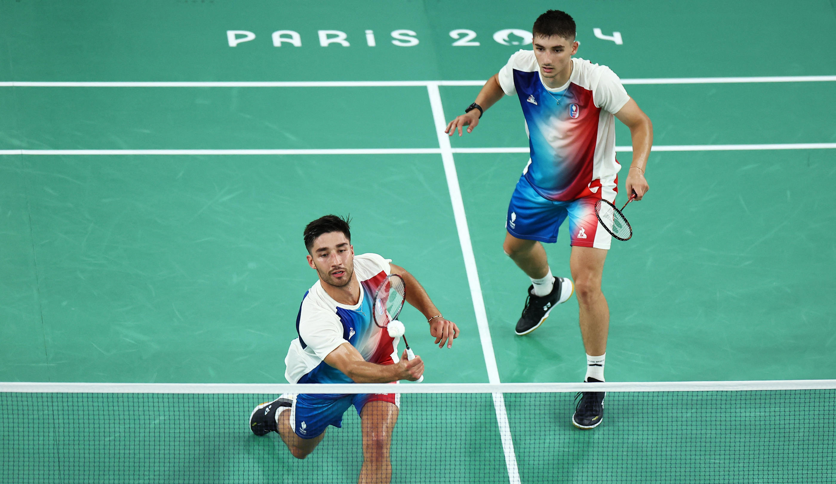 Les frères Popov ont concédé leur 2e revers en phase de poule de double homme ce dimanche face aux Coréens Kang - Seo. REUTERS/Ann Wang