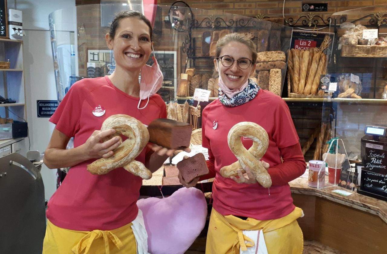 <b></b> Rue de la Jonquière (XVIIe) vendredi. Camille (à gauche) et Florentine mettent du rose dans leurs pains et pâtisseries, et reversent 1 € à la ligue contre le cancer pour chaque produit rose acheté dans leur boulangerie artisanale.