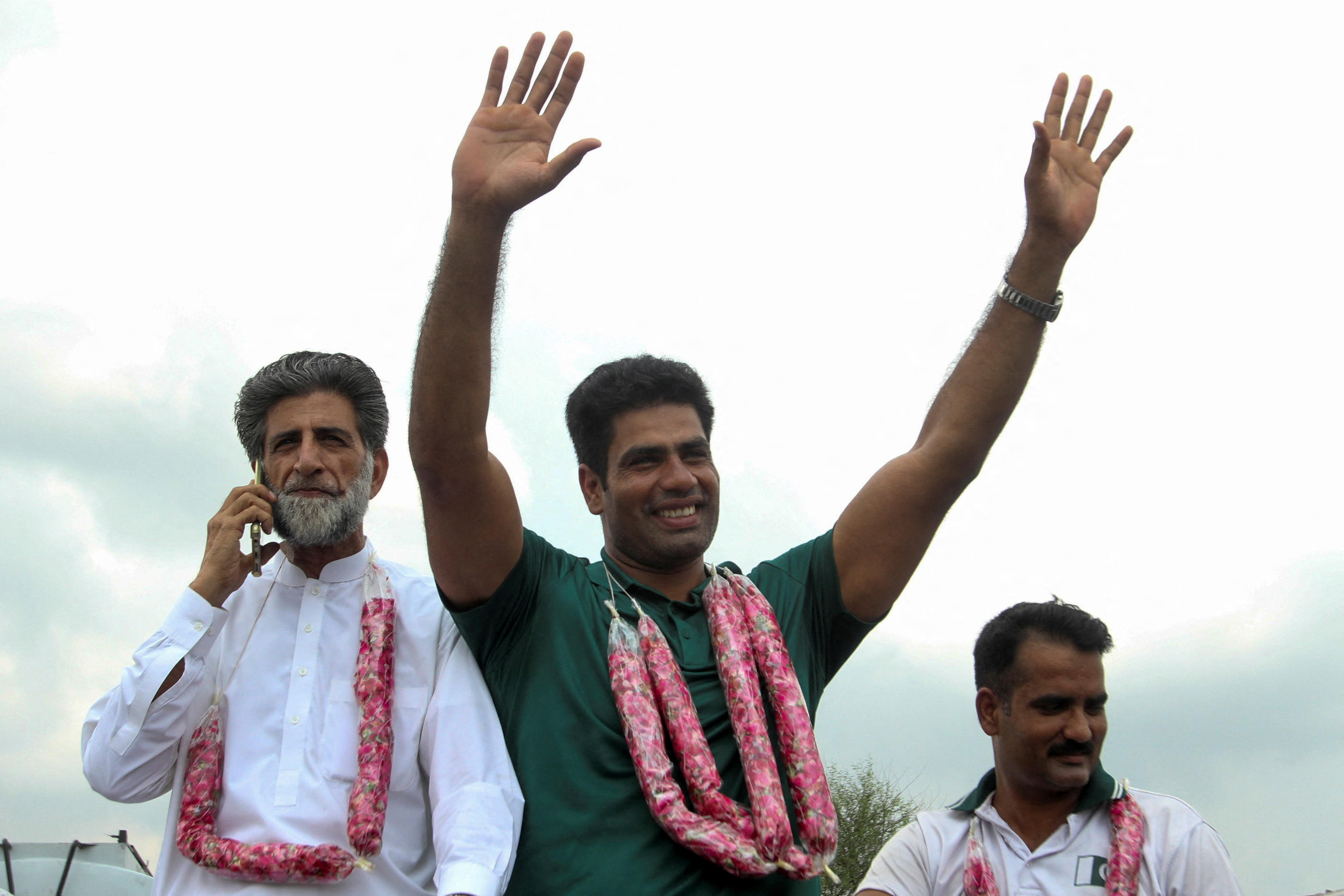 Pakistan 11 août 2024. Arshad Nadeem, le premier médaillé d'or en athlétisme de l'histoire du Pakistan a été accueilli en héros national à son retour chez lui. REUTERS/Stringer