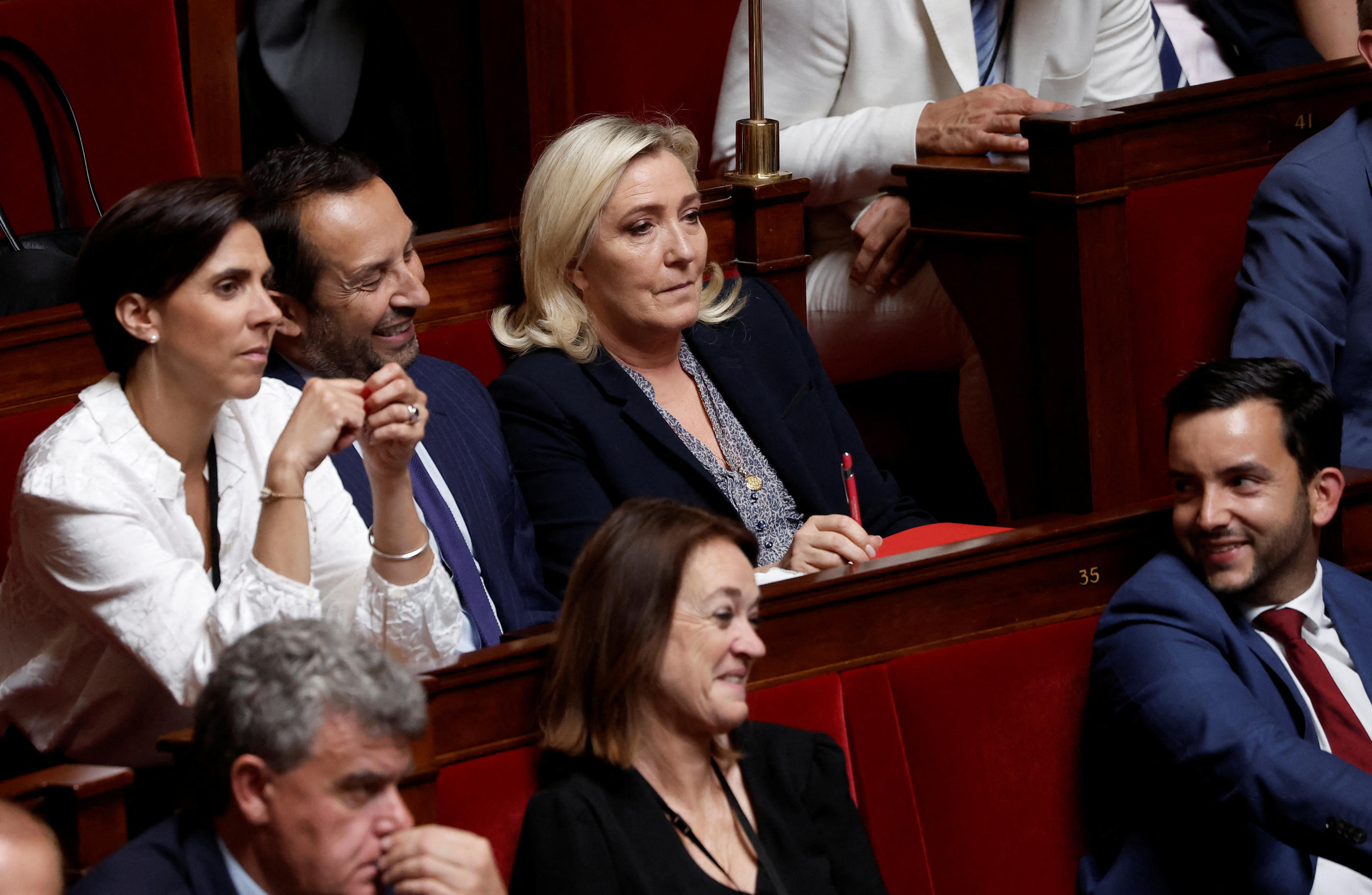 Les députés RN Laure Lavalette, Sébastien Chenu et Marine Le Pen à l'Assemblée nationale le 6 juillet 2022. REUTERS/Benoit Tessier