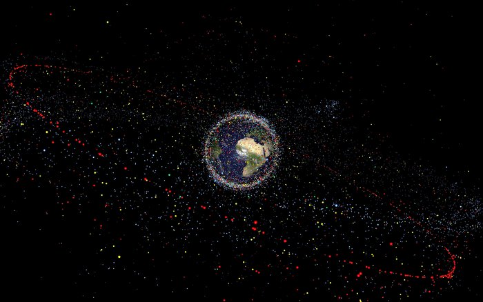 Vue de l'espace, la Terre est cernée par les satellites artificiels. L'Agence spatiale européenne invite les acteurs du spatial à signer sa charte Zéro Débris. ESA