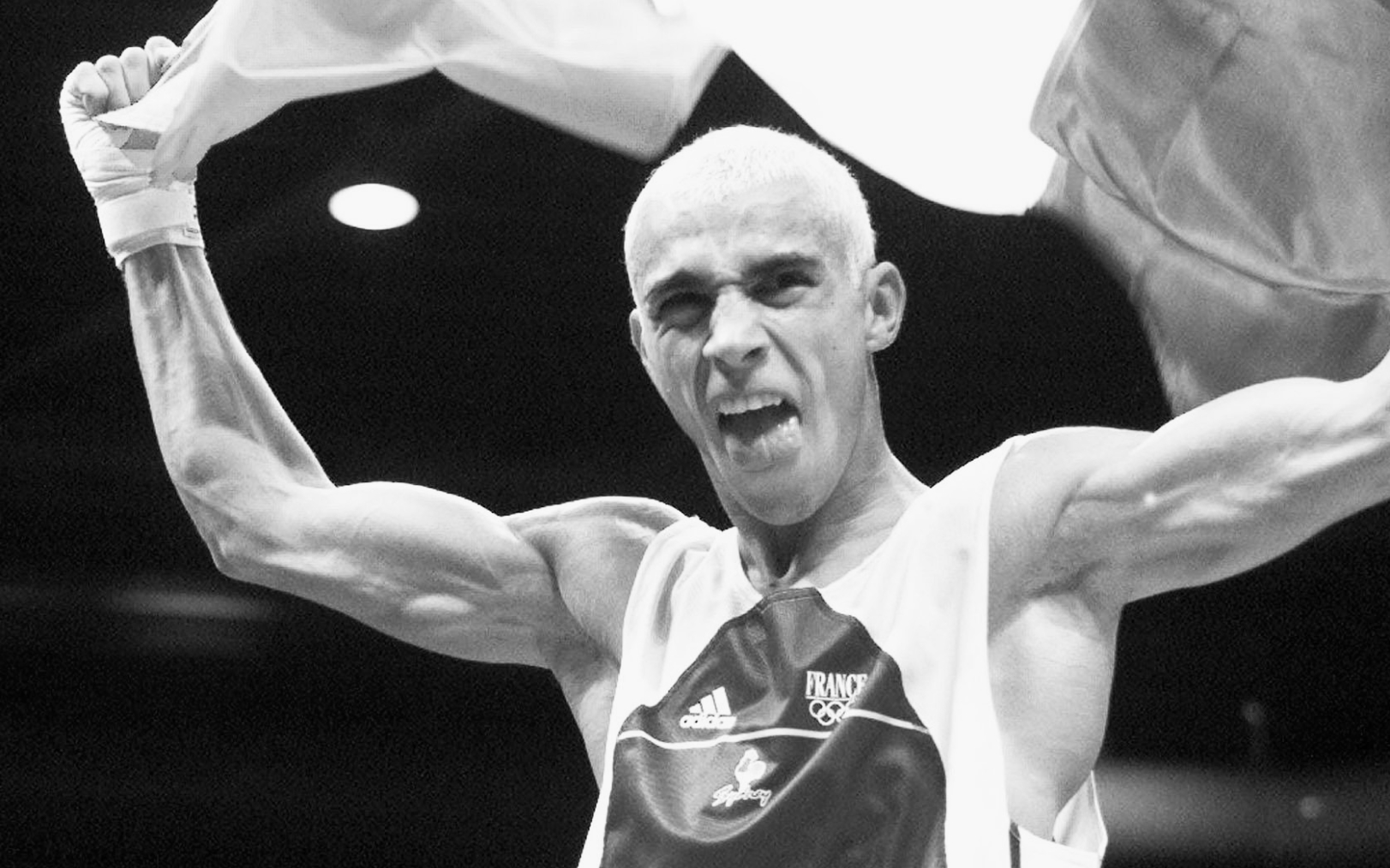 Le 30 septembre 2000, à Sydney en Australie, Brahim Asloum décroche la médaille d’or olympique de boxe, dans la catégorie -48 kg./ Reuters