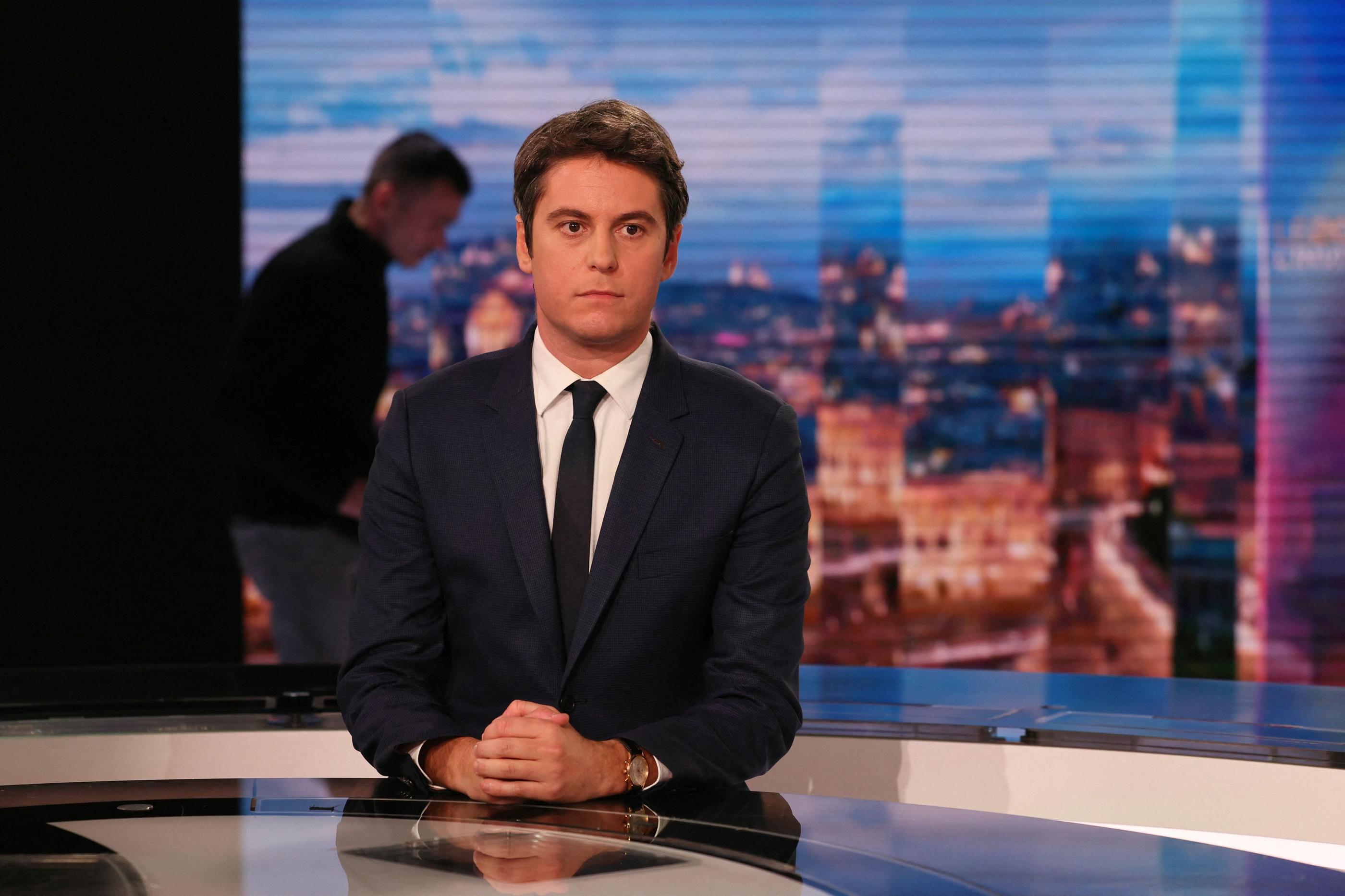 Le Premier ministre Gabriel Attal sur le plateau du JT de TF1, mercredi soir. AFP/Alain Jocard