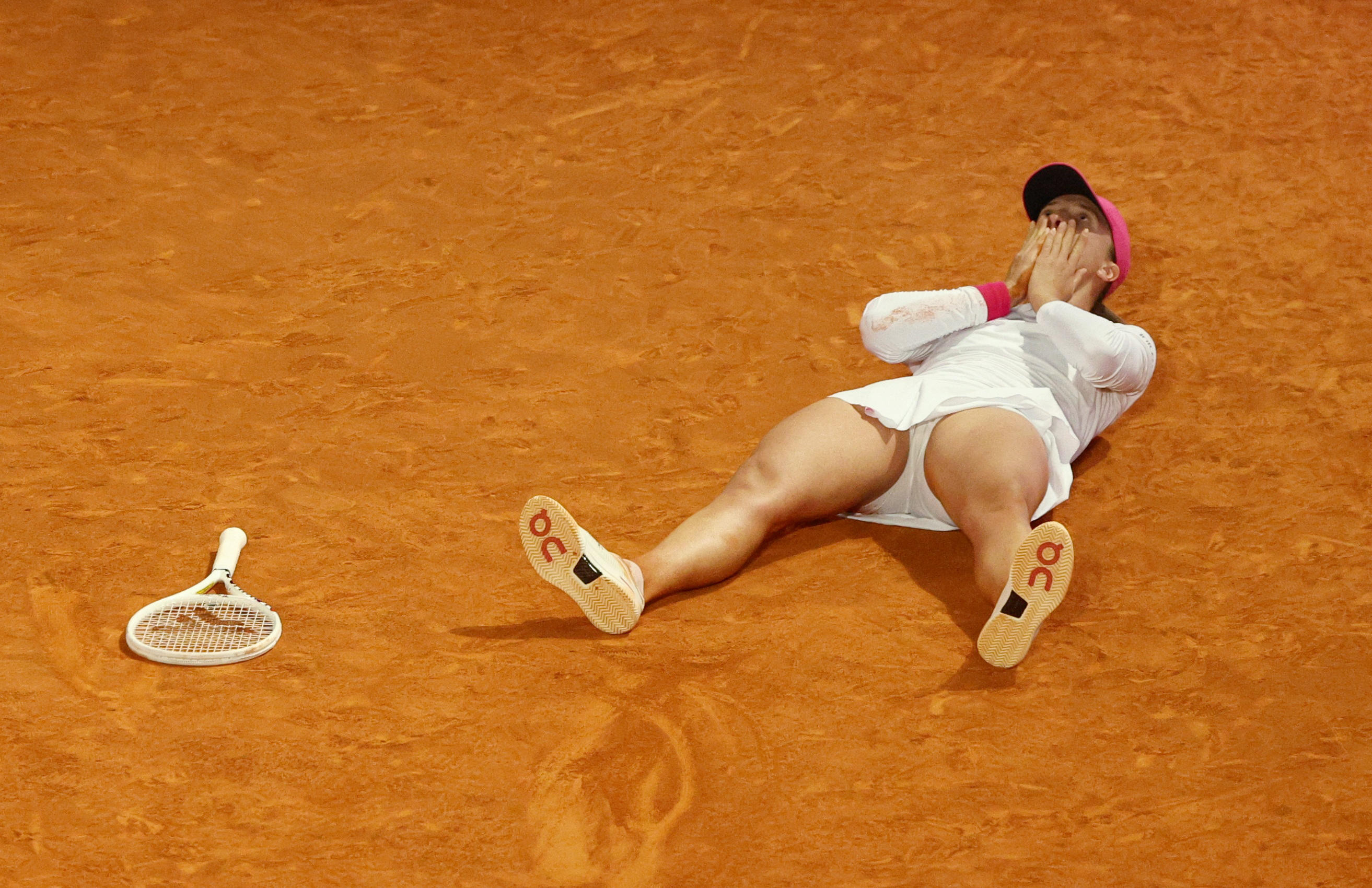 Iga Swiatek a remporté son 20e titre en carrière, ce samedi, contre Aryna Sabalenka (V. Santos Moura / Reuters).