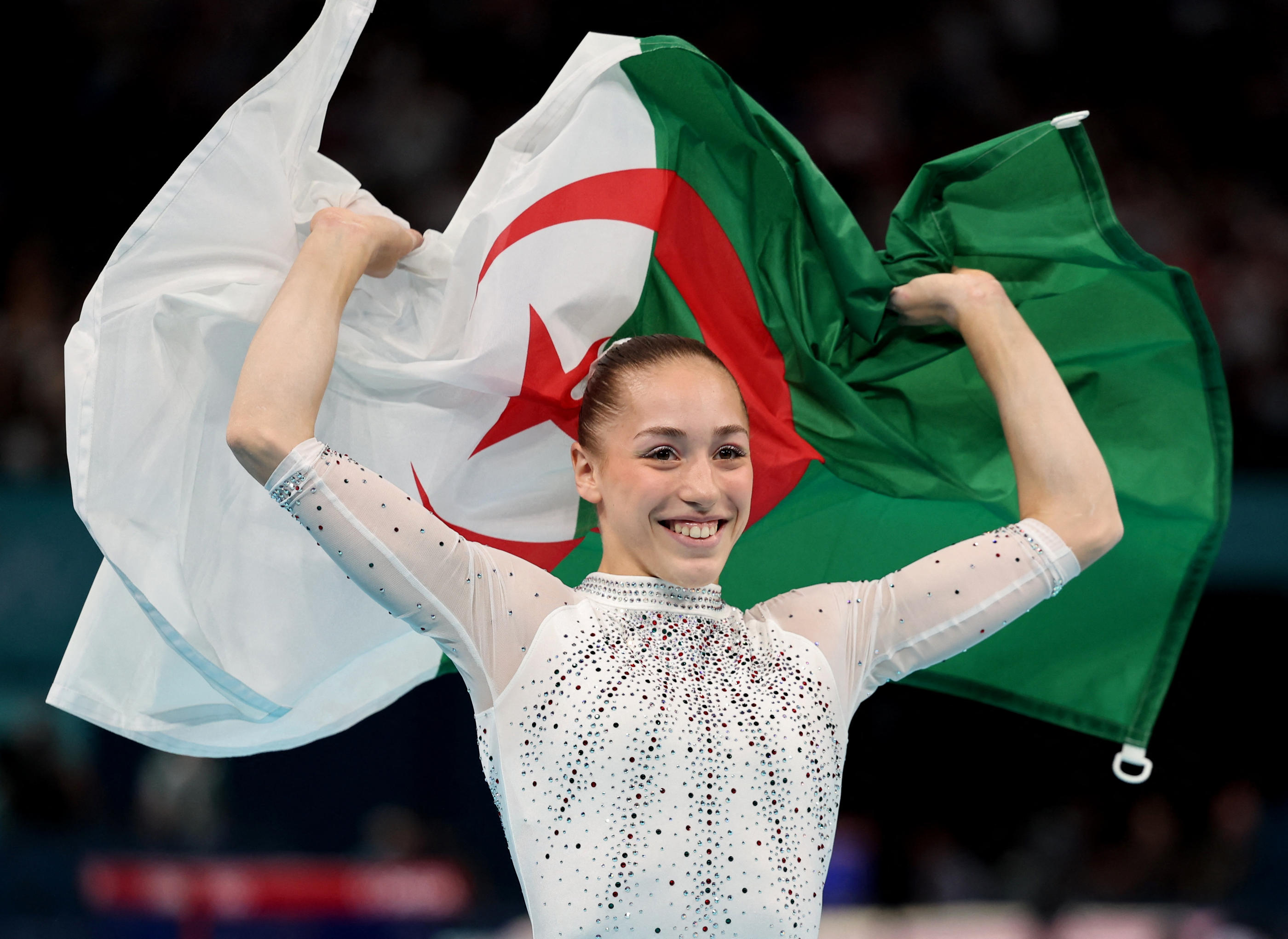 Rejetée par la fédération française de gymnastique, Kaylia Nemour est allée chercher l'or olympique aux barres asymétriques sous les couleurs de l'Algérie. REUTERS/Mike Blake