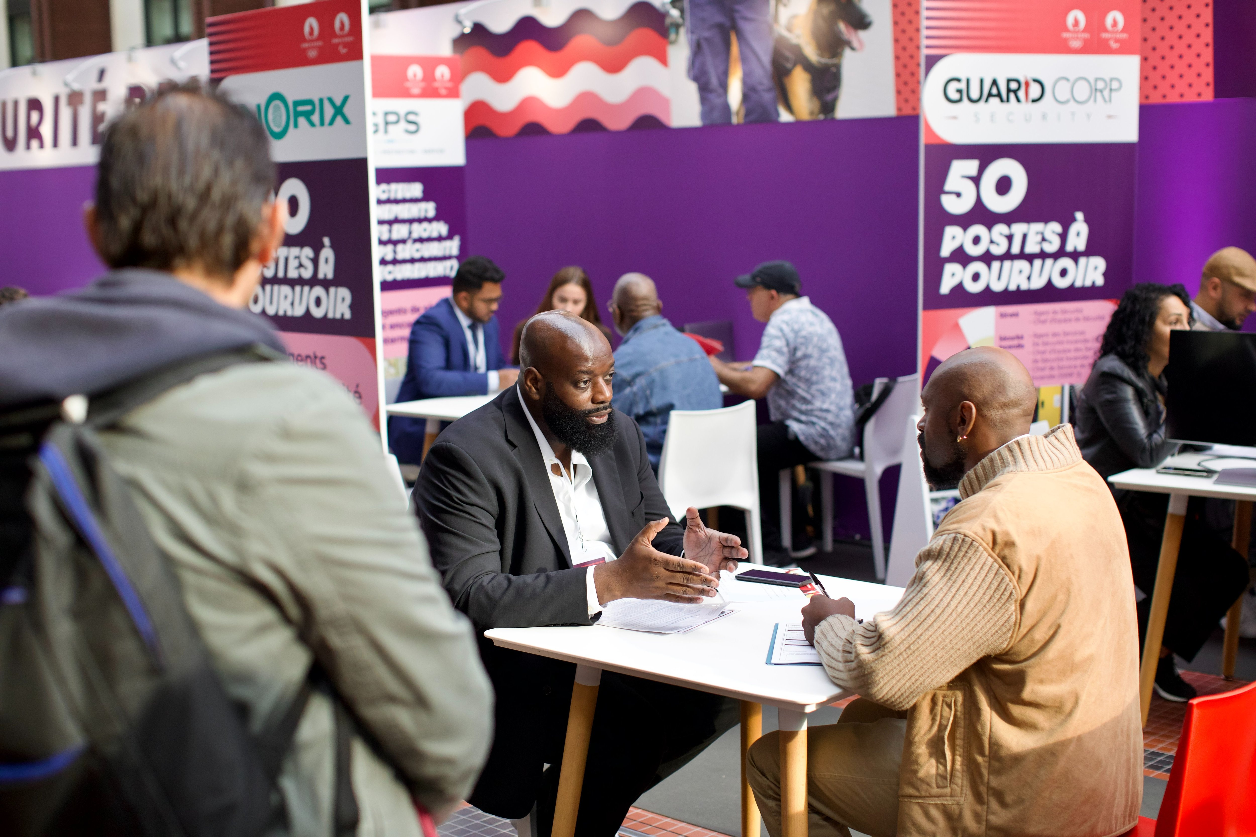 Job forums dedicated to the Games, like here at the Cité du Cinéma in Saint-Denis (Seine-Saint-Denis), on September 26, 2023, allow recruiters to meet candidates.  Credits: Paris 2024/Emeric Fohlen