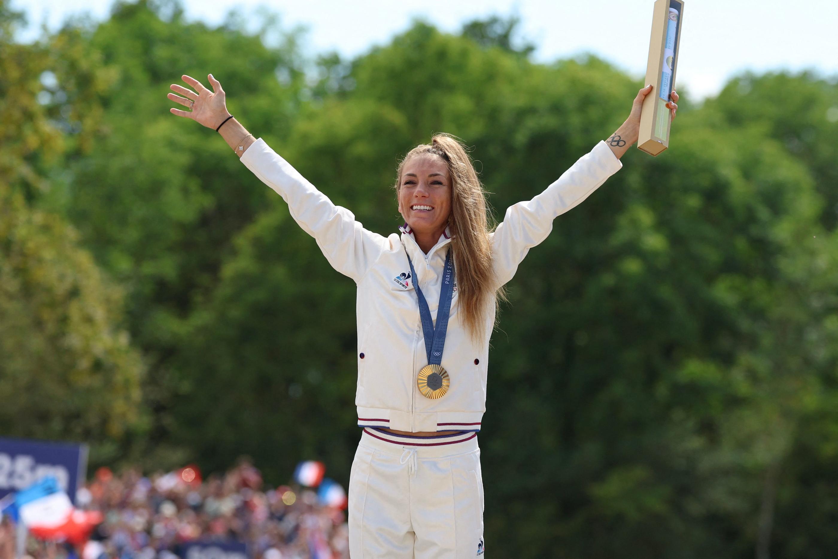 Pauline Ferrand-Prévot savoure son titre olympique, sans doute le sacre le plus prestigieux de sa carrière AFP/E. Dunand