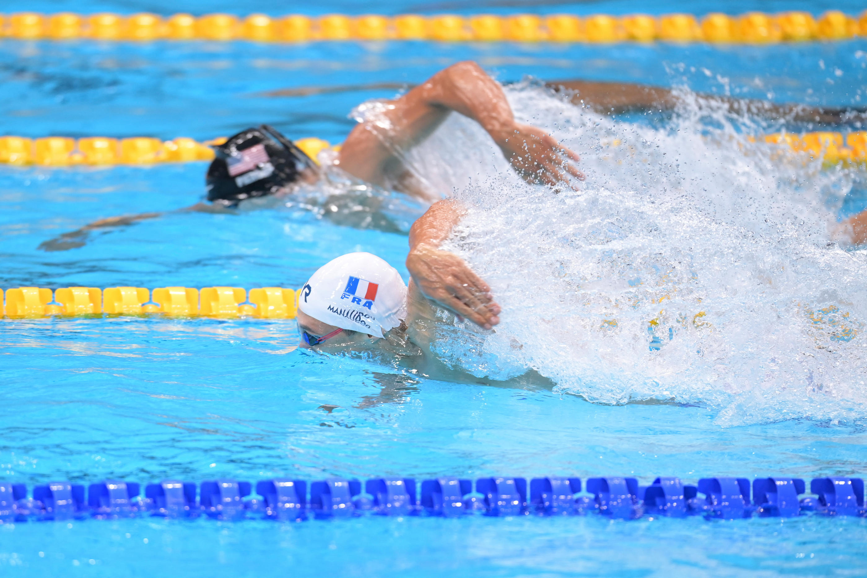Les épreuves olympiques de natation en ligne et les phases finales de water-polo se dérouleront dans une piscine construite pour l’occasion à l'Arena de Nanterre. (Illustration) AFP/Stéphane Kempinaire