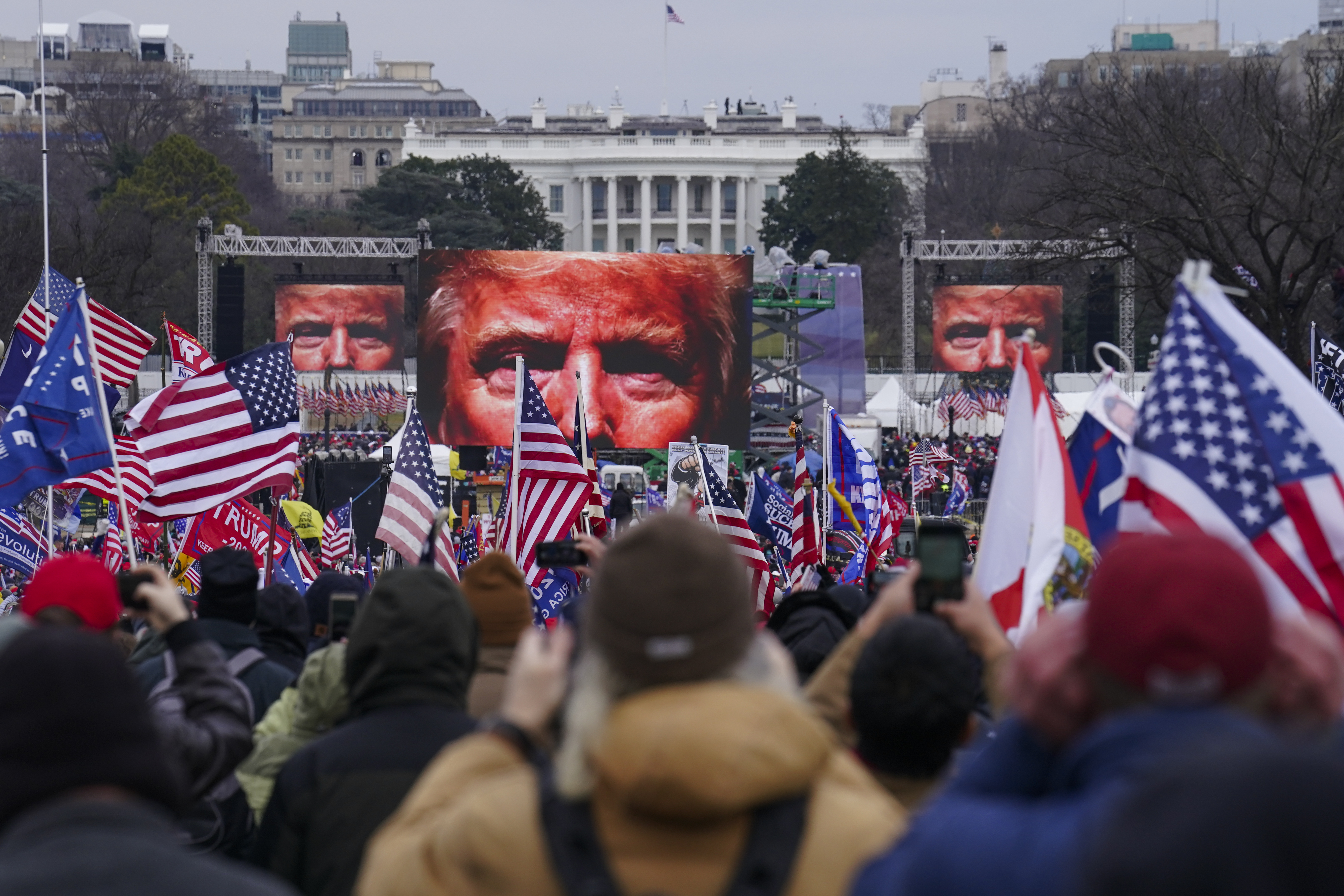 Trump supporters participate in a rally Wednesday, Jan. 6, 2021 in Washington. As Congress prepared to affirm President-elect Joe Biden's victory, thousands gathered to show their support for President Donald Trump and his baseless claims of election fraud.  (AP Photo/John Minchillo)