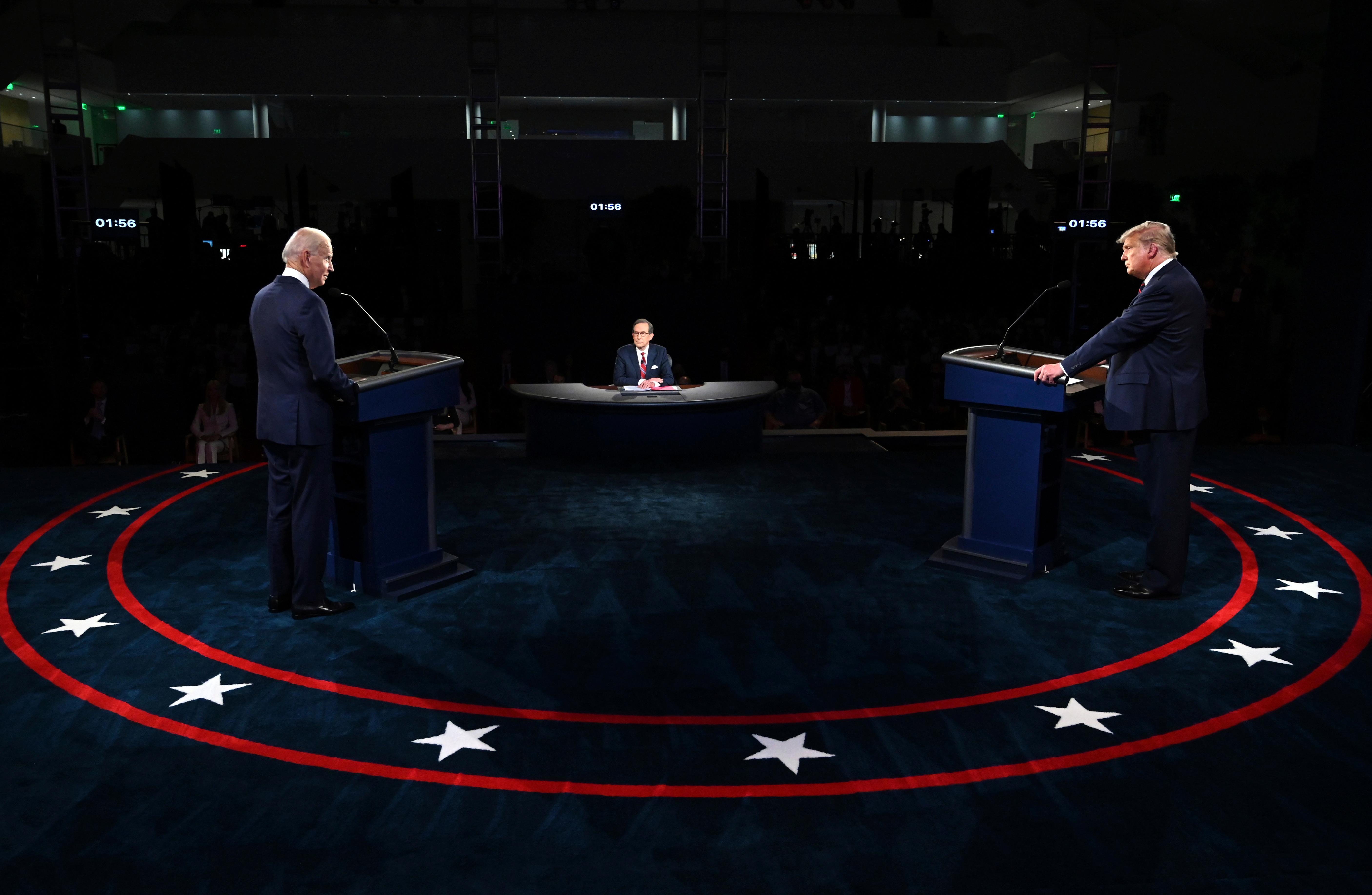 President Donald Trump and Democratic presidential candidate former Vice President Joe Biden participate in the first presidential debate Tuesday, Sept. 29, 2020, at Case Western University and Cleveland Clinic, in Cleveland. (Olivier Douliery/Pool vi AP)