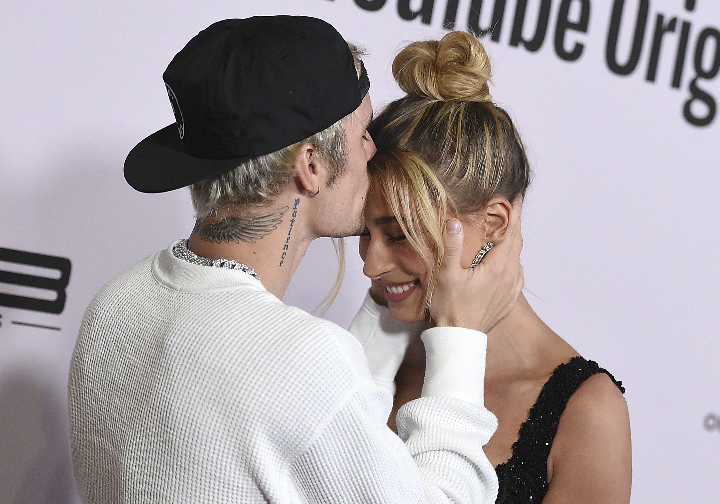 Justin Bieber and Hailey Baldwin arrive at the Los Angeles premiere of "Justin Bieber: Seasons," Monday, Jan. 27, 2020. (Photo by Jordan Strauss/Invision/AP)