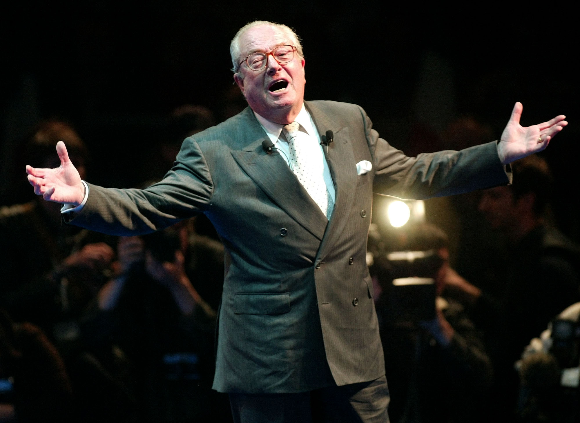 French far-right presidential candidate Jean-Marie Le Pen gestures during a meeting in Marseille, southern France, Saturday, May 2, 2002. Le Pen will face President and conservative candidate Jacques Chirac in the May 5 presidential election runoff. (AP PHOTO/Lionel Cironneau)
