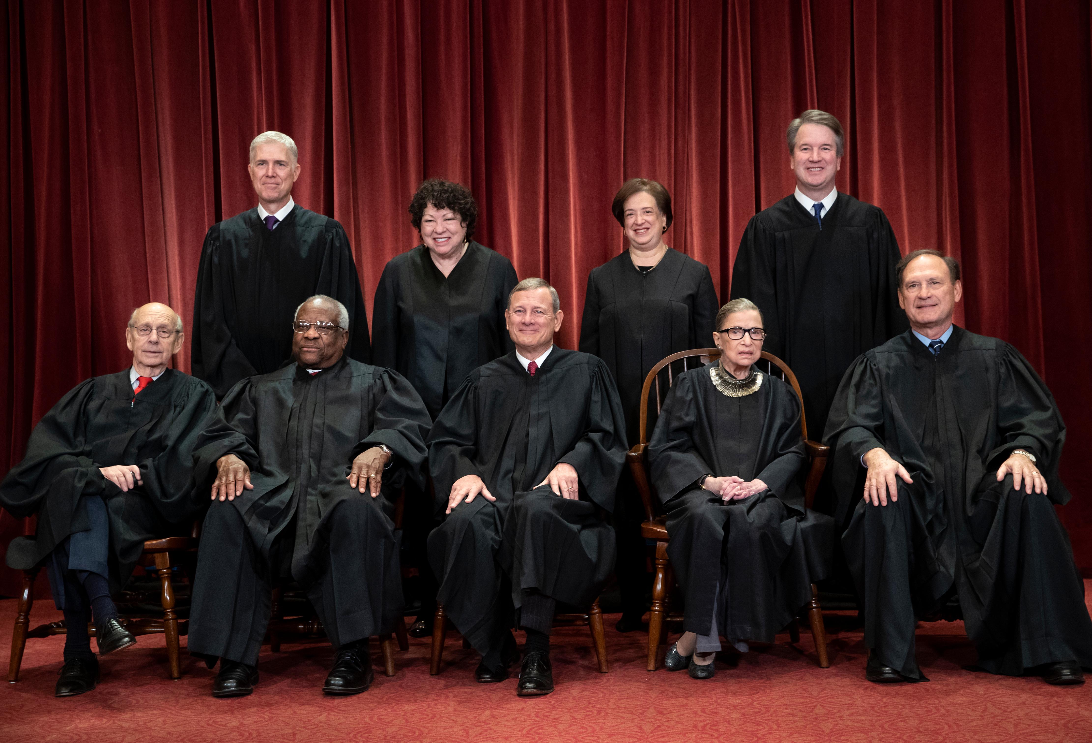 FILE - In this Nov. 30, 2018, file photo, the justices of the U.S. Supreme Court gather for a formal group portrait to include the new Associate Justice, top row, far right, at the Supreme Court building in Washington. Seated from left: Associate Justice Stephen Breyer, Associate Justice Clarence Thomas, Chief Justice of the United States John G. Roberts, Associate Justice Ruth Bader Ginsburg and Associate Justice Samuel Alito Jr. Standing behind from left: Associate Justice Neil Gorsuch, Associate Justice Sonia Sotomayor, Associate Justice Elena Kagan and Associate Justice Brett M. Kavanaugh. Its the time of the year when Supreme Court justices can get testy, but they might have to find a new way to show it. (AP Photo/J. Scott Applewhite, File)