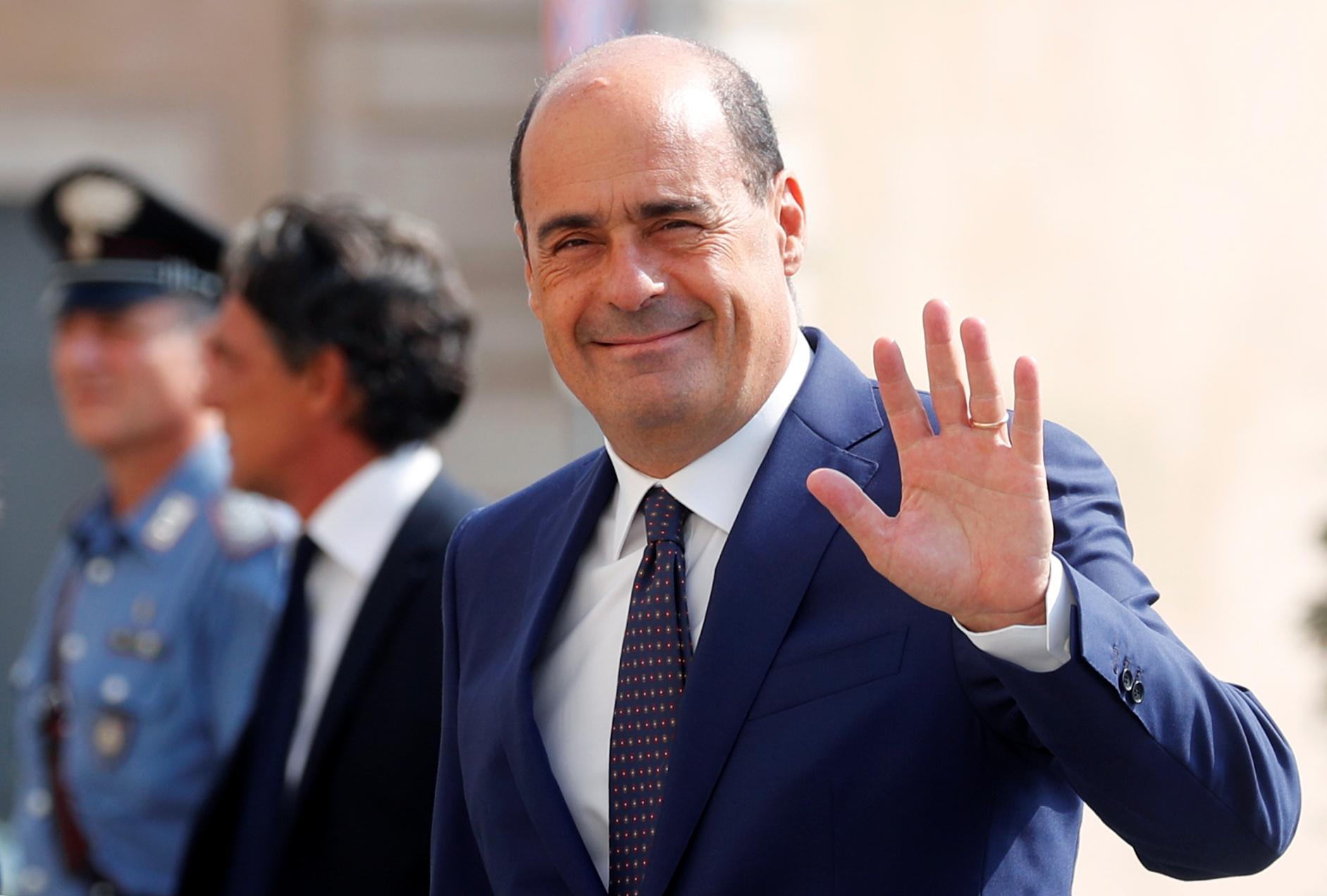 Democratic Party leader Nicola Zingaretti waves as he walks into the Presidential Palace for consultations with Italian President Sergio Mattarella in Rome, Italy, August 28, 2019. REUTERS/Remo Casilli