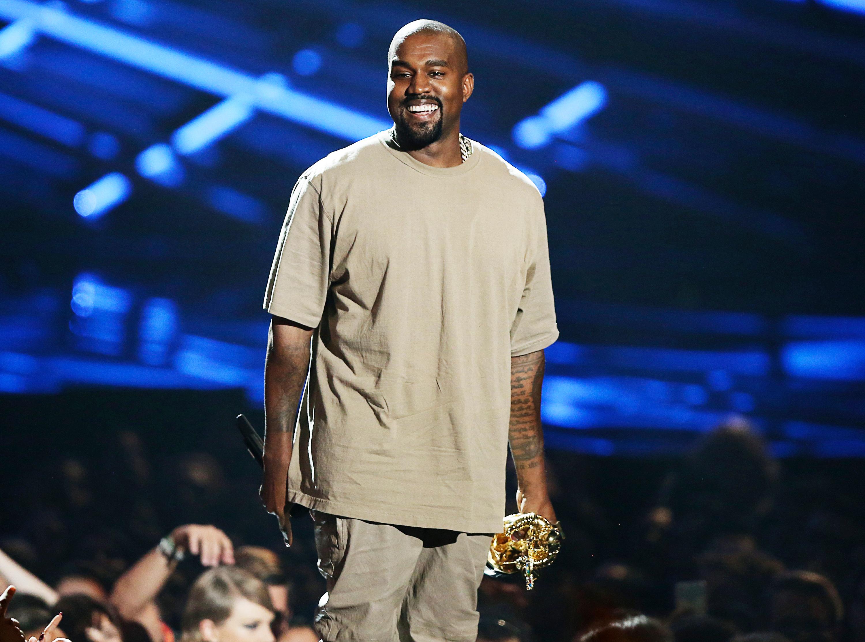 Kanye West accepts the video vanguard award at the MTV Video Music Awards at the Microsoft Theater on Sunday, Aug. 30, 2015, in Los Angeles. (Photo by Matt Sayles/Invision/AP)