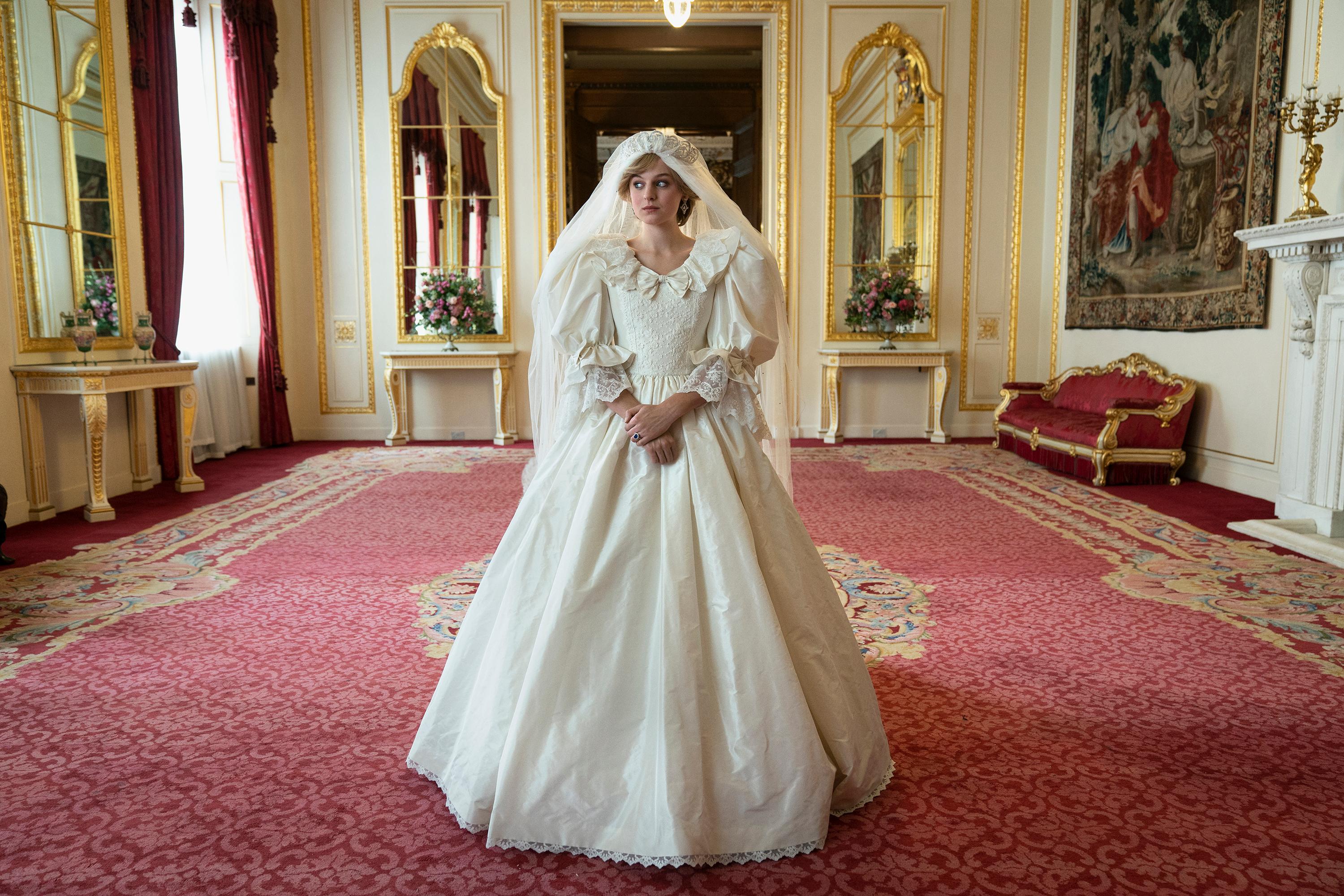 This image released by Netflix shows Emma Corrin in a scene from "The Crown." Season four premieres on Sunday, Nov. 15. (Des Willie/Netflix via AP)