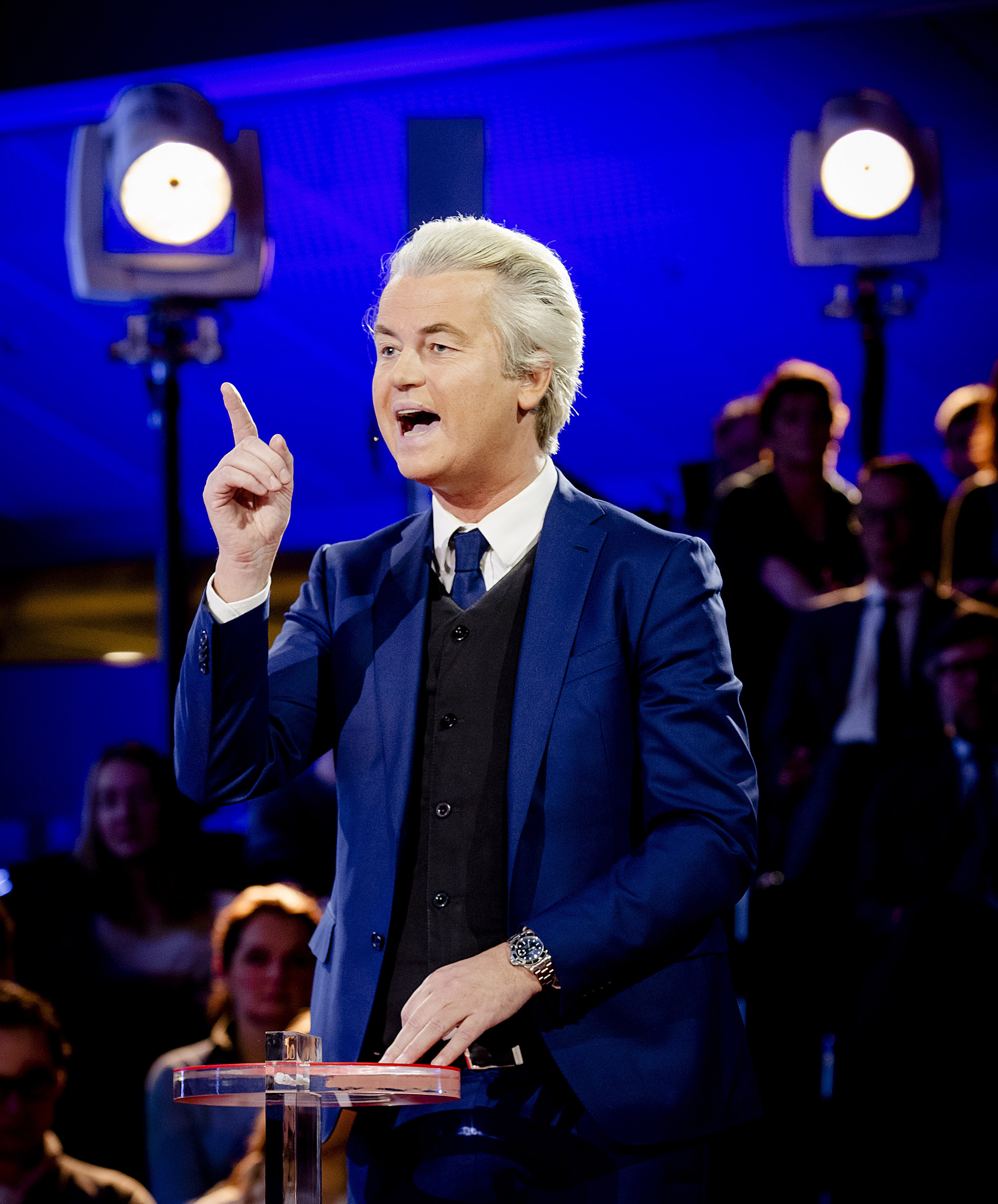 PVV party leader and firebrand anti-Islam lawmaker Geert Wilders gestures during the closing debate at parliament in The Hague, Netherlands, Tuesday, March 14, 2017. Amid unprecedented international attention, the Dutch go to the polls Wednesday in a parliamentary election that is seen as a bellwether for the future of populism in a year of crucial votes in Europe. (Robin van Lonkhuijsen ANP POOL via AP)