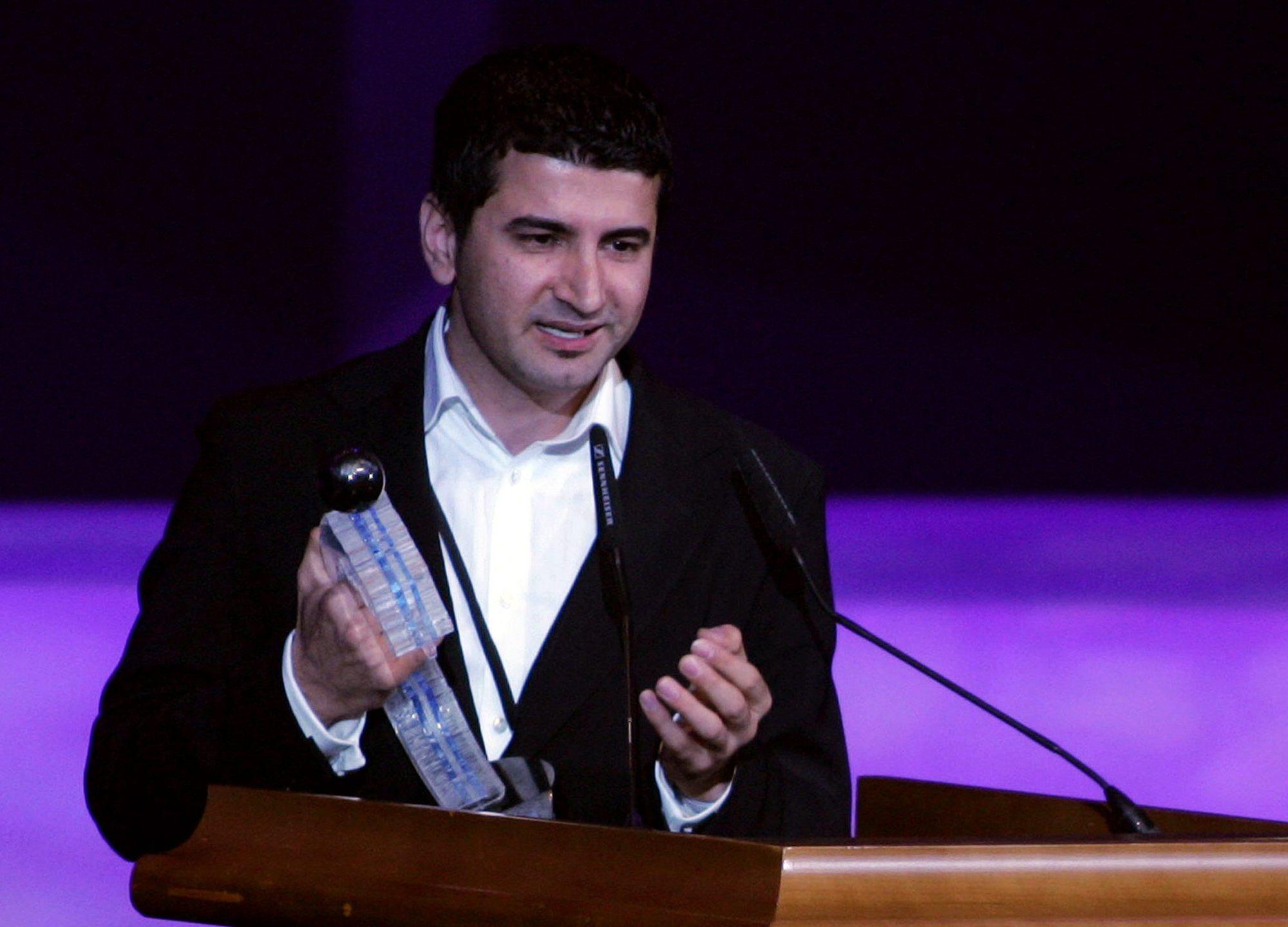 Norway-based Iraqi Kurdish director Hisham Zaman accepts the award for best short film for 'Bawke' (Father) during the Middle East International Film Festival (MEIFF) awards ceremony in Abu Dhabi, 19 October 2007. Abu Dhabi hosted its maiden film festival this week as it vies to become a regional cinema hub with plans to open a branch of the New York Film Academy. The festival featured more than 80 films from 38 countries. AFP PHOTO/Karim SAHIB