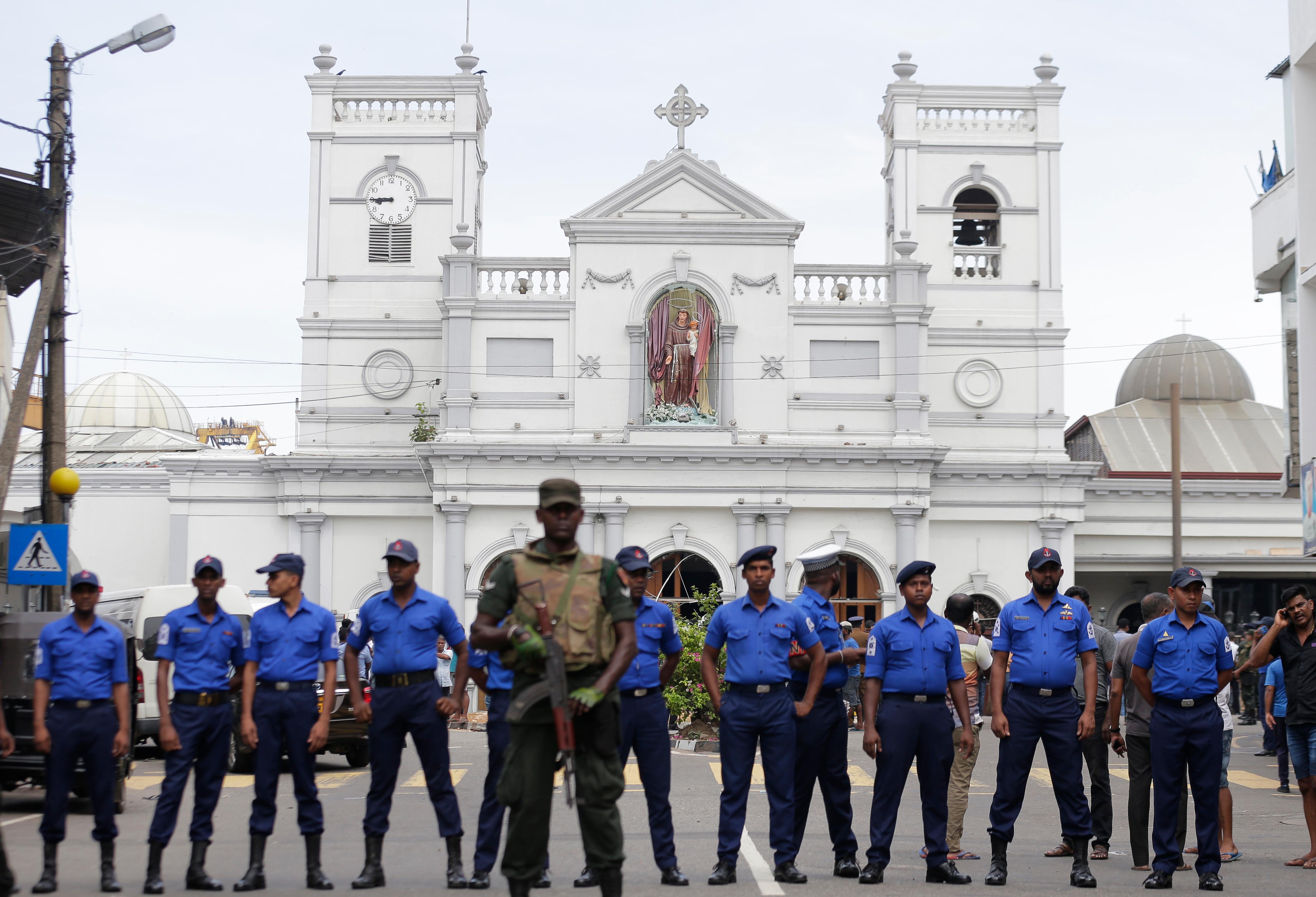 Sri Lankan Army soldiers secure the area around St. Anthony's Shrine after a blast in Colombo, Sri Lanka, Sunday, April 21, 2019. A Sri Lanka hospital spokesman says several blasts on Easter Sunday have killed dozens of people. (AP Photo/Eranga Jayawardena)