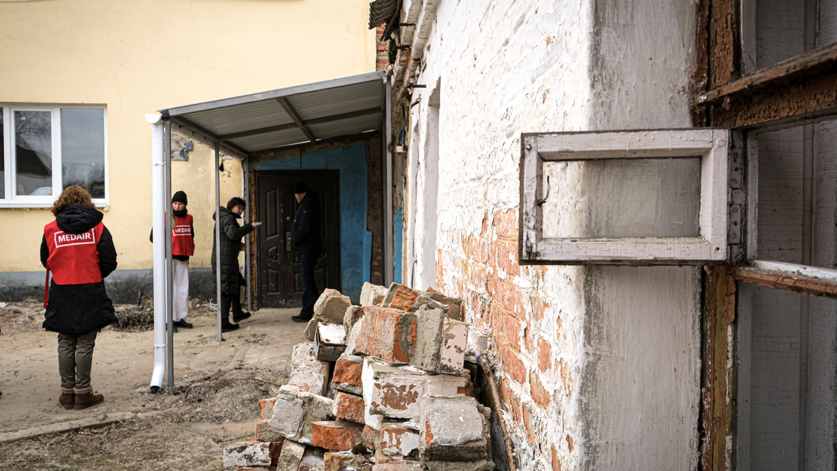 In Ukraine Medair has established teems in seven cities to ensure a viable supply chain and where Medair can support communities who are welcoming people from the conflict-affected areas. Along with identyfying needs for critical relief items, Ukraine teams are conducting assessments of civil infrastructure including hospitals and water systems. Where local markets are functioning, the preferred option for delivering assistance will be through cash distributions. Medair is also offering psychosocial support activities and provosding training in Psychological First Aisd for Ukrainians. Trostianets is a town near Sumy. The town was under occupation from the first day of crisis. Many buildings there were damaged by blast waves or by aerial bombs. One of these buildings is Primary health Care for Children (PHC). Bue to the damage, the windows were blown out and the roof was leaking. Therefore, it was important to restore it as soon as possible, because 5 thousands children medical support and help there.