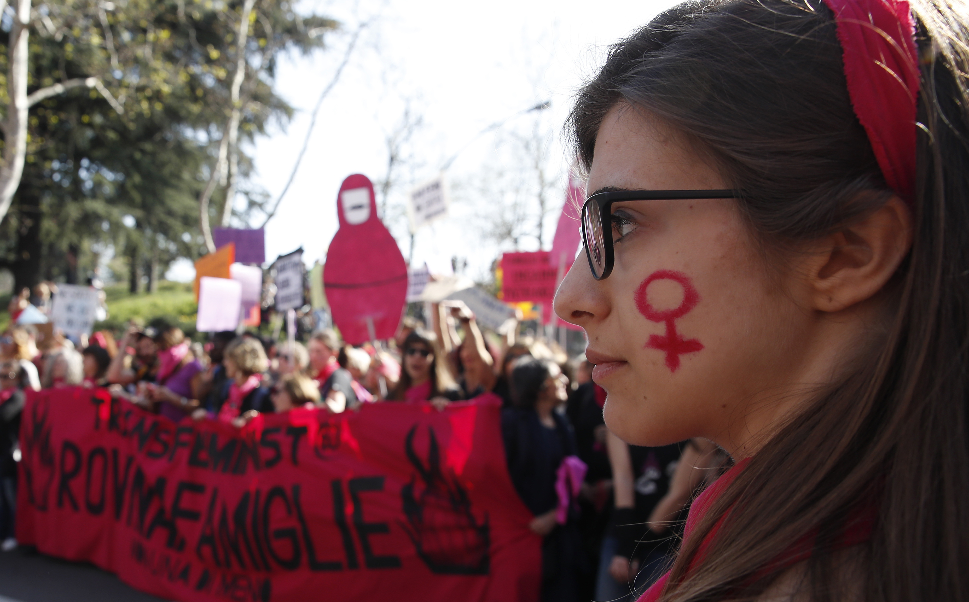 People march to protest the World Congress of Families, in Verona, Italy, Saturday, March 30, 2019. A congress in Italy under the auspices of a U.S. organization that defines family as strictly centering around a mother and father has made Verona ?Äî the city of Romeo and Juliet ?Äî the backdrop for a culture clash over family values, with a coalition of civic groups mobilizing against what they see as a counter-reform movement to limit LGBT and women's rights. (AP Photo/Antonio Calanni)