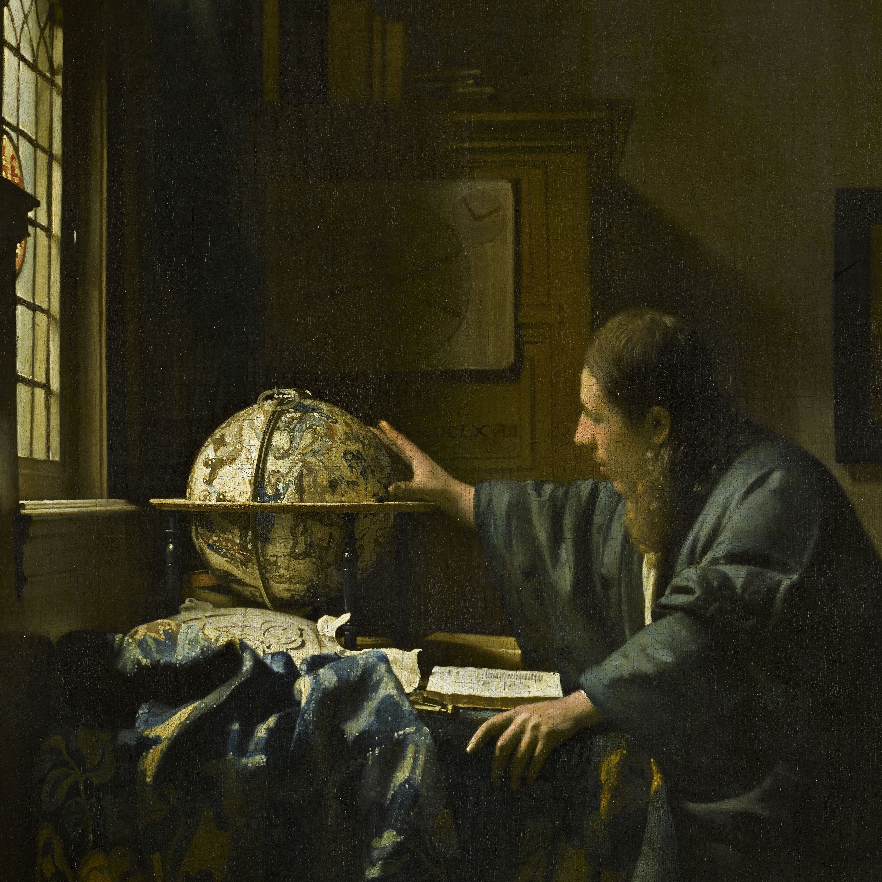 'El Astrónomo' (1668), por el pintor holandés Johannes Vermeer. Posiblemente, el científico representado era el polímata Antonie van Leeuwenhoek (1680–1686).