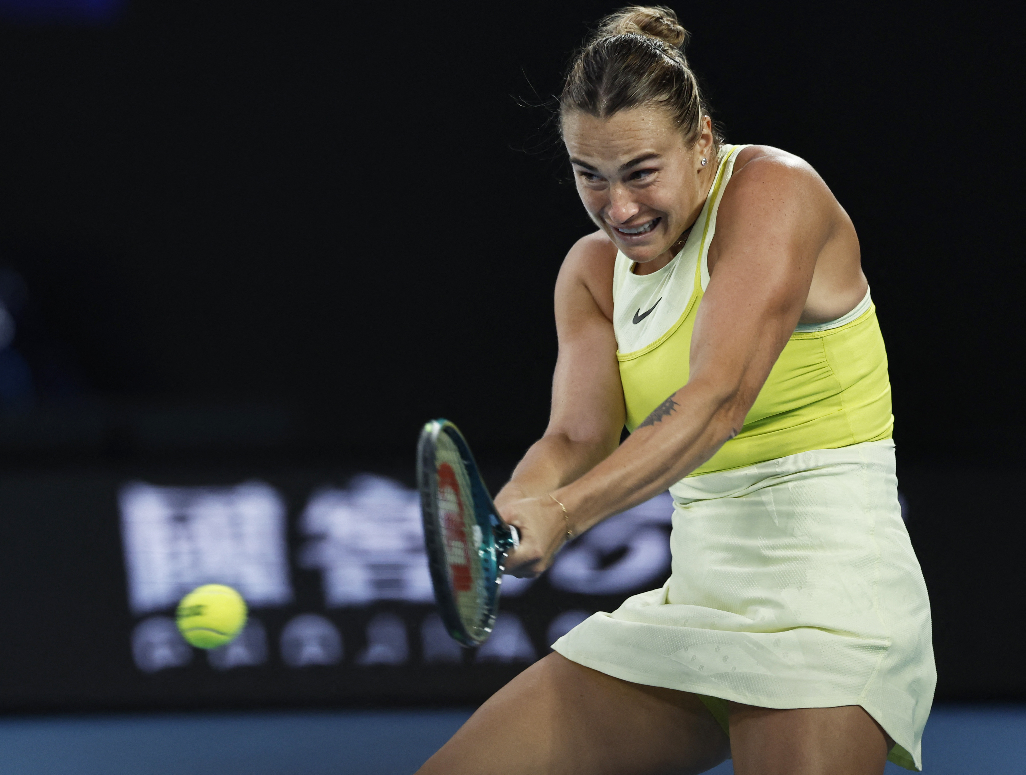 Tennis - Australian Open - Melbourne Park, Melbourne, Australia - January 23, 2025 Belarus' Aryna Sabalenka in action during her semi final match against Spain's Paula Badosa REUTERS/Tingshu Wang